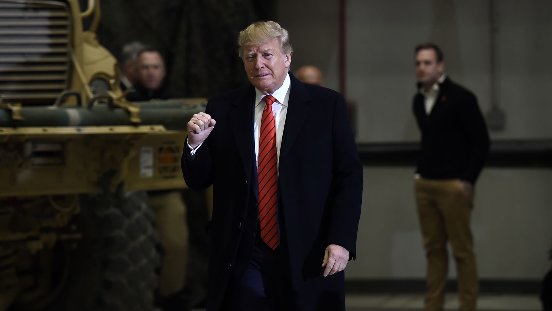 Trump gestures as he arrives to speak to the US soldiers during a surprise Thanksgiving day visit at Bagram Air Field, on November 28, 2019 in Afghanistan. 