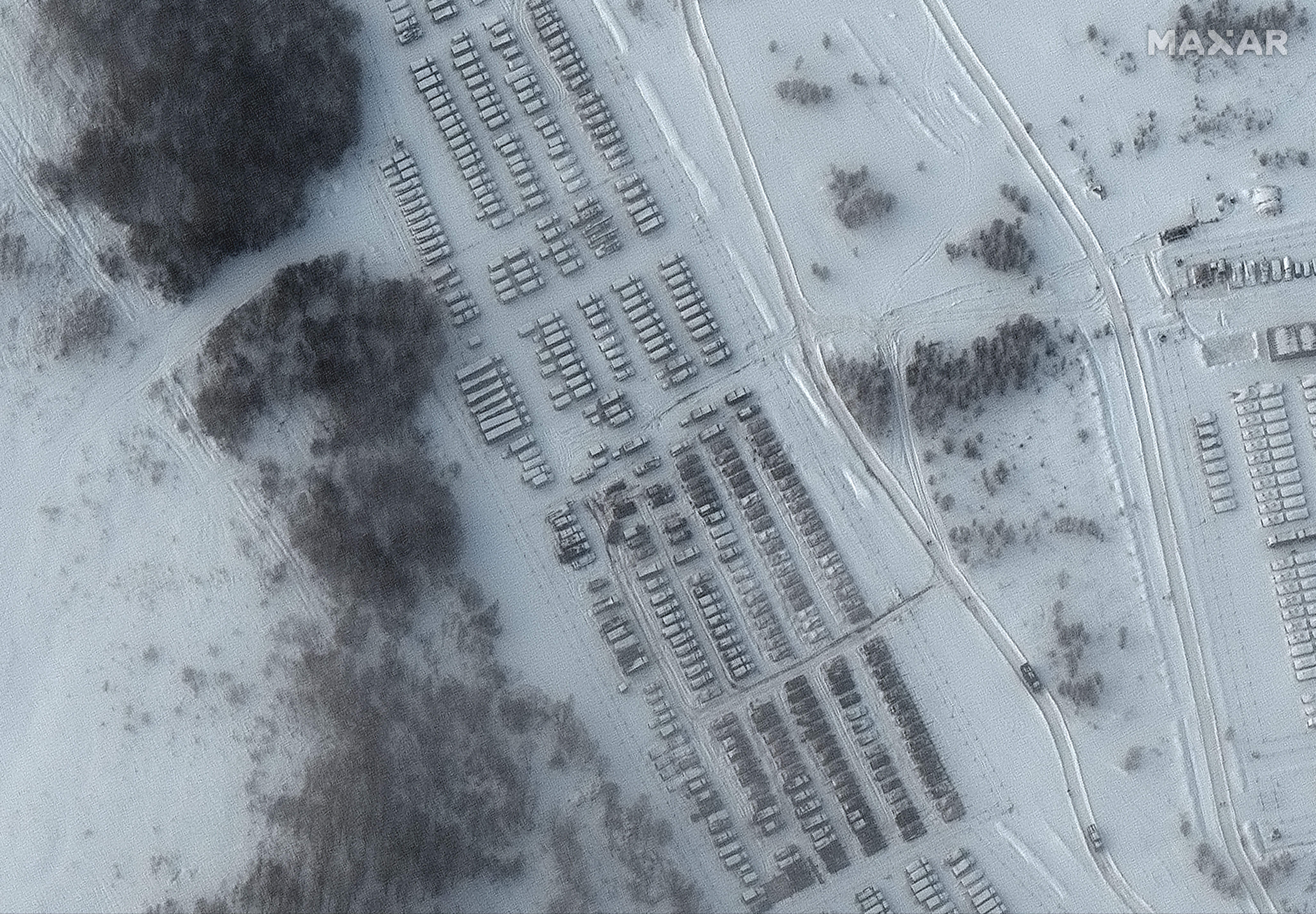 Tanks, artillery and other support equipment staged near Yelnya, Russia.