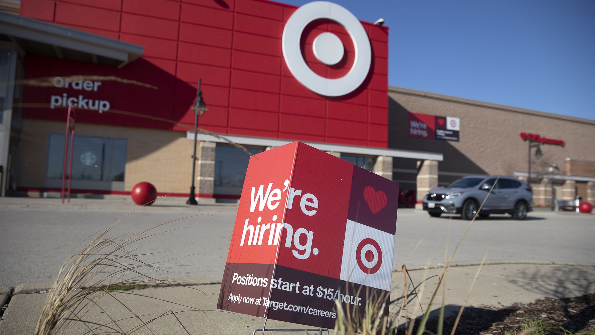 A "We're Hiring" sign outside a Target store in Shorewood, Illinois,