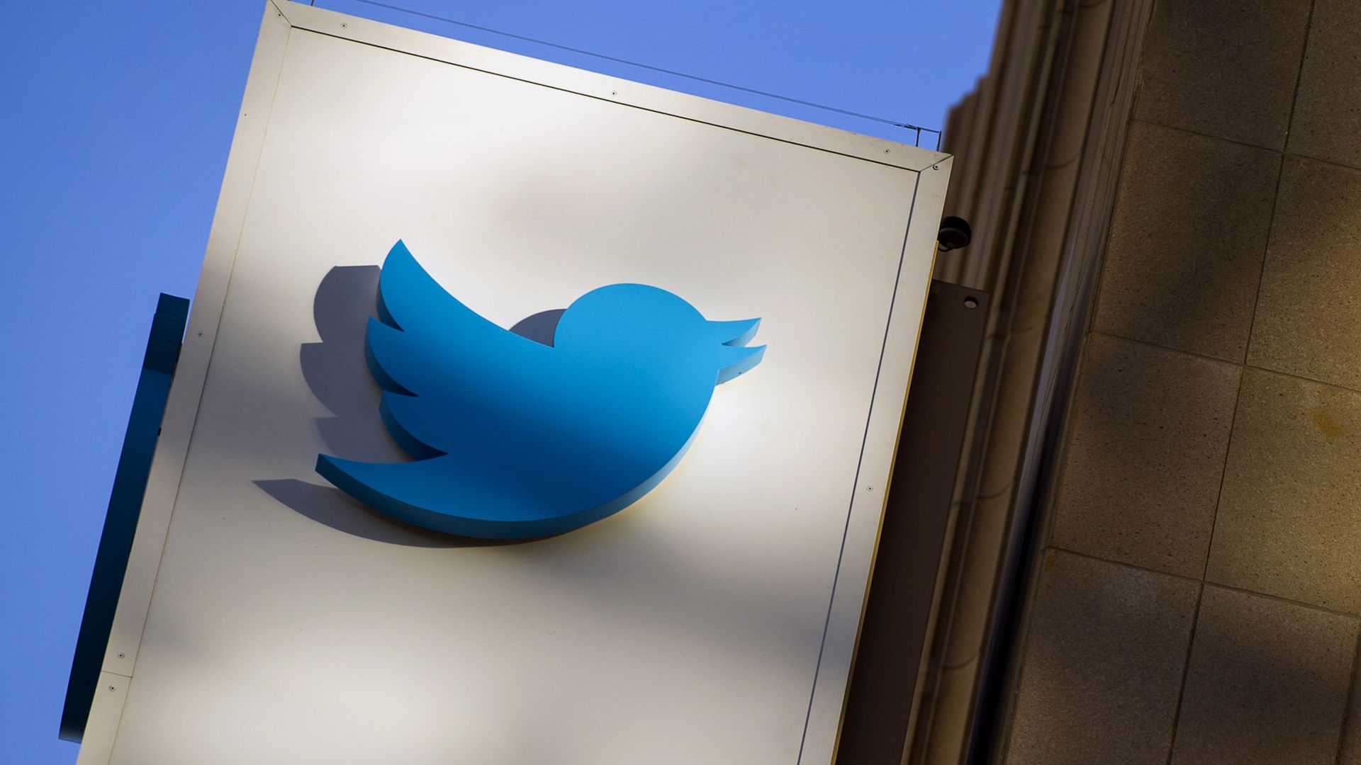 The Twitter Inc. logo is displayed on the facade of the company's headquarters in San Francisco, California