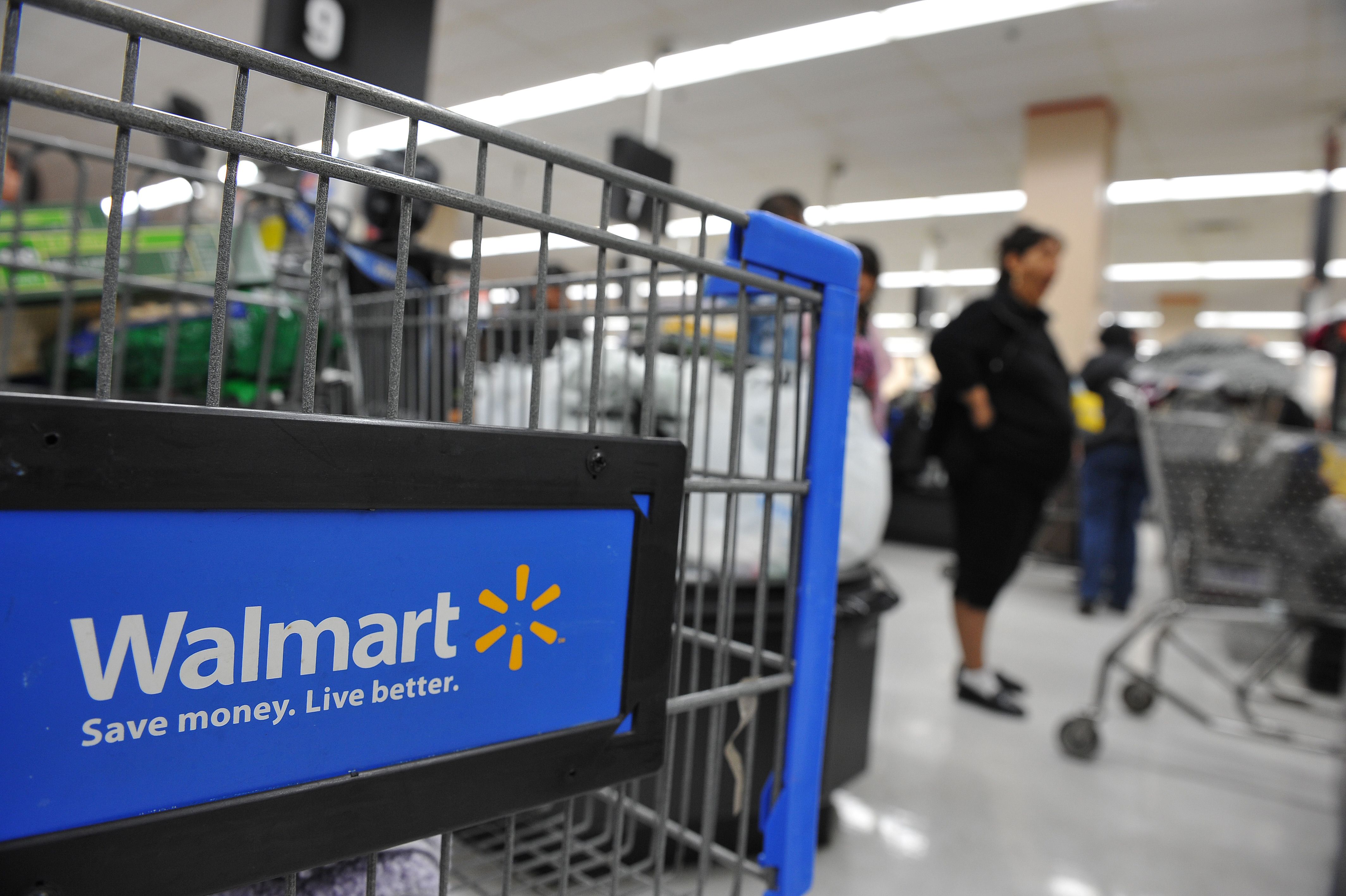 Walmart is raising wages and giving bonuses, citing tax cuts Axios