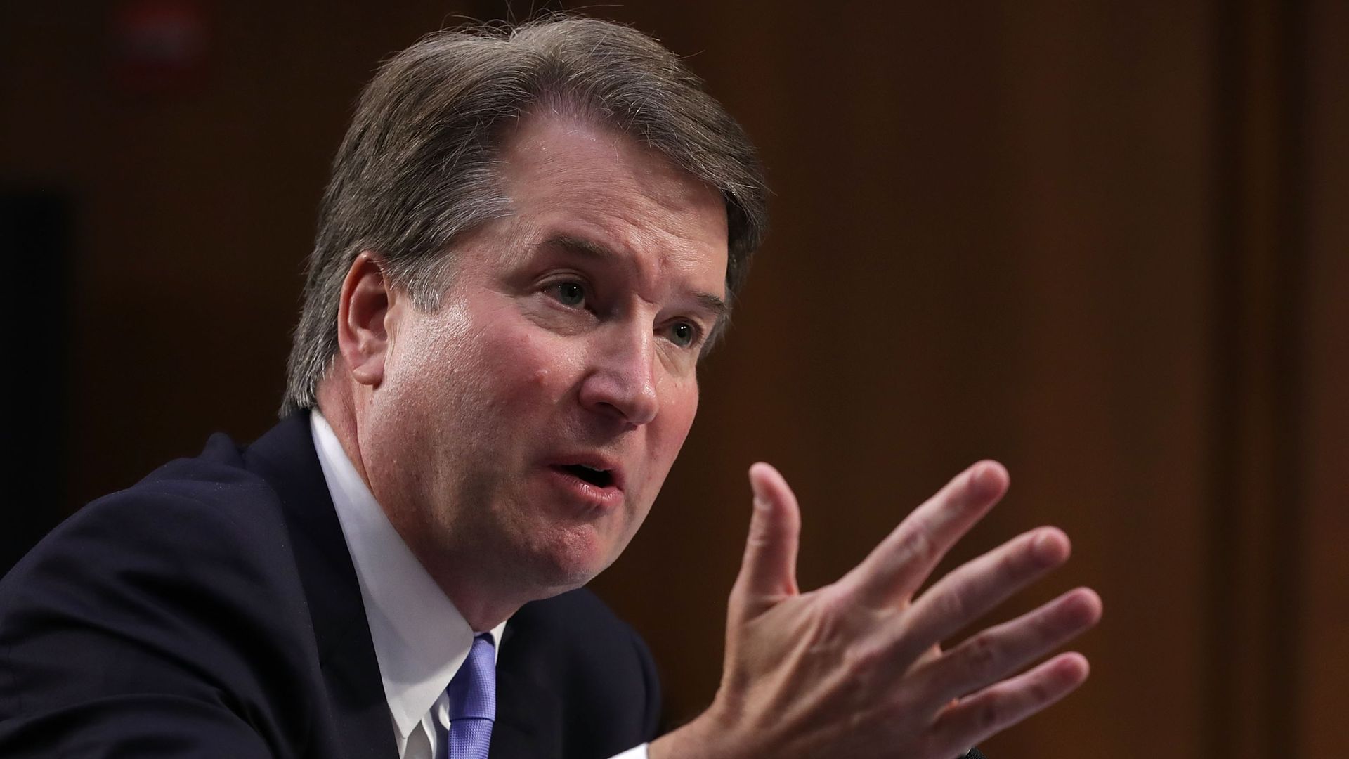Brett Kavanaugh gestures with his hand while testifying before the Senate Judiciary Committee.