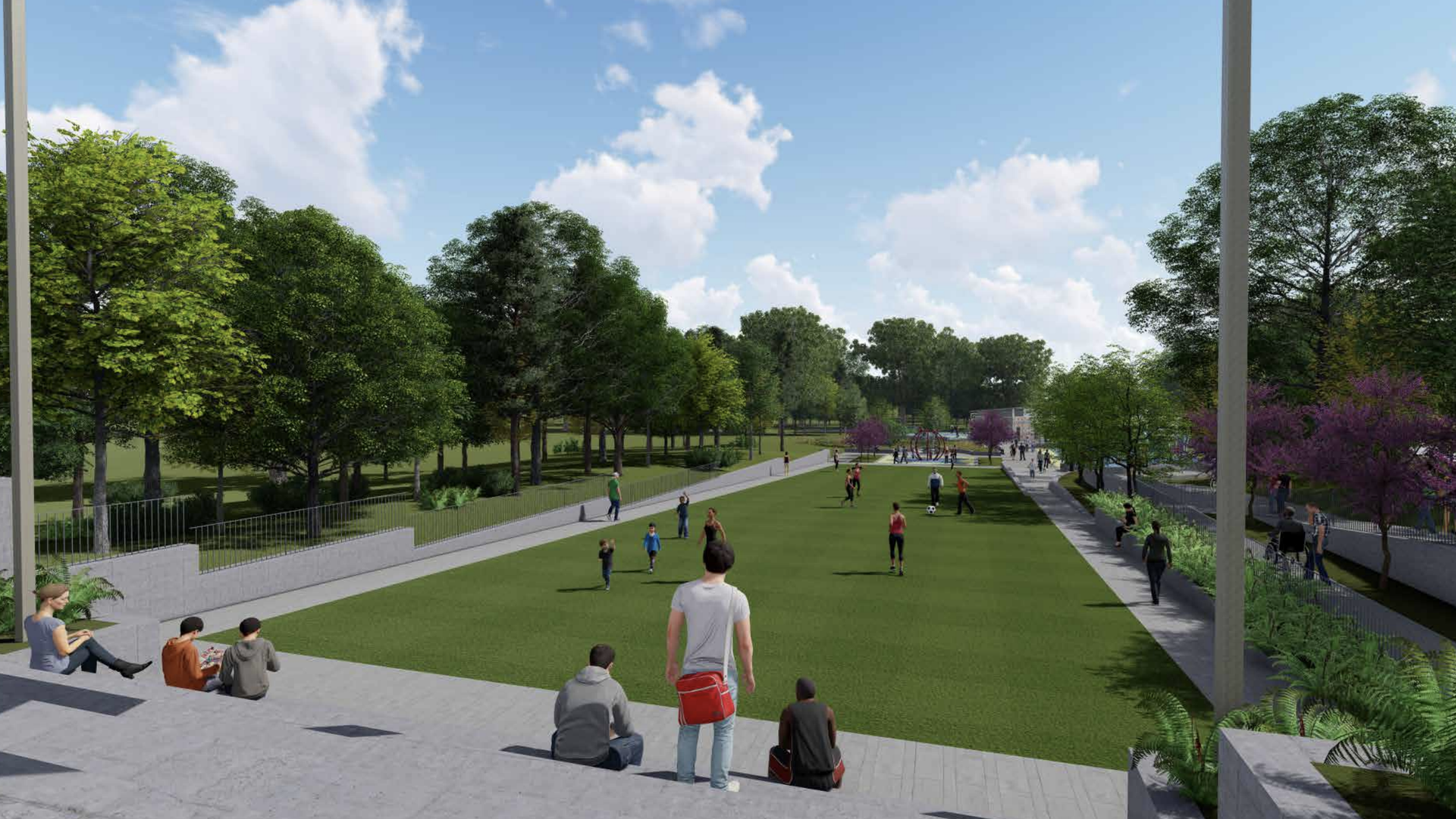 People sit on a solar-shade structure in a park overlooking a long green where people are playing