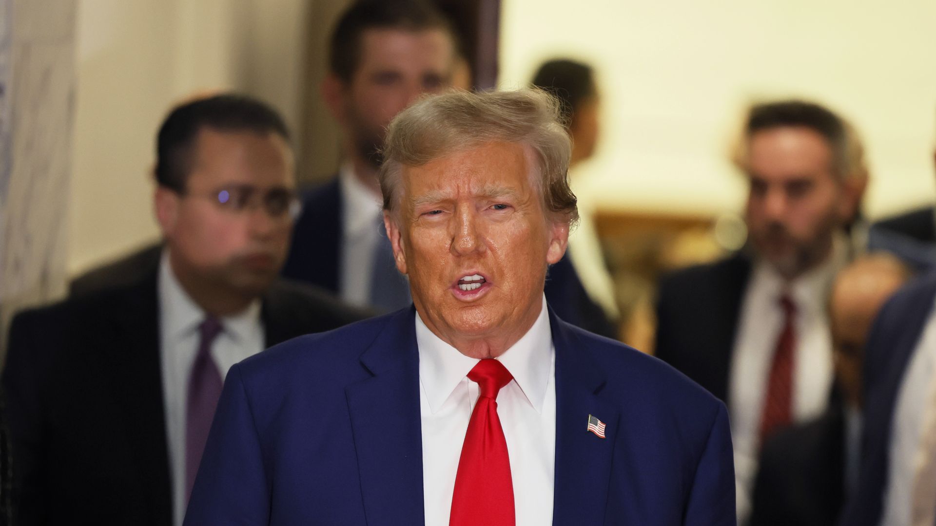 Former U.S. President Donald Trump speaks as he exits the courtroom for a break during his civil fraud trial at New York Supreme Court on January 11, 2024 in New York City