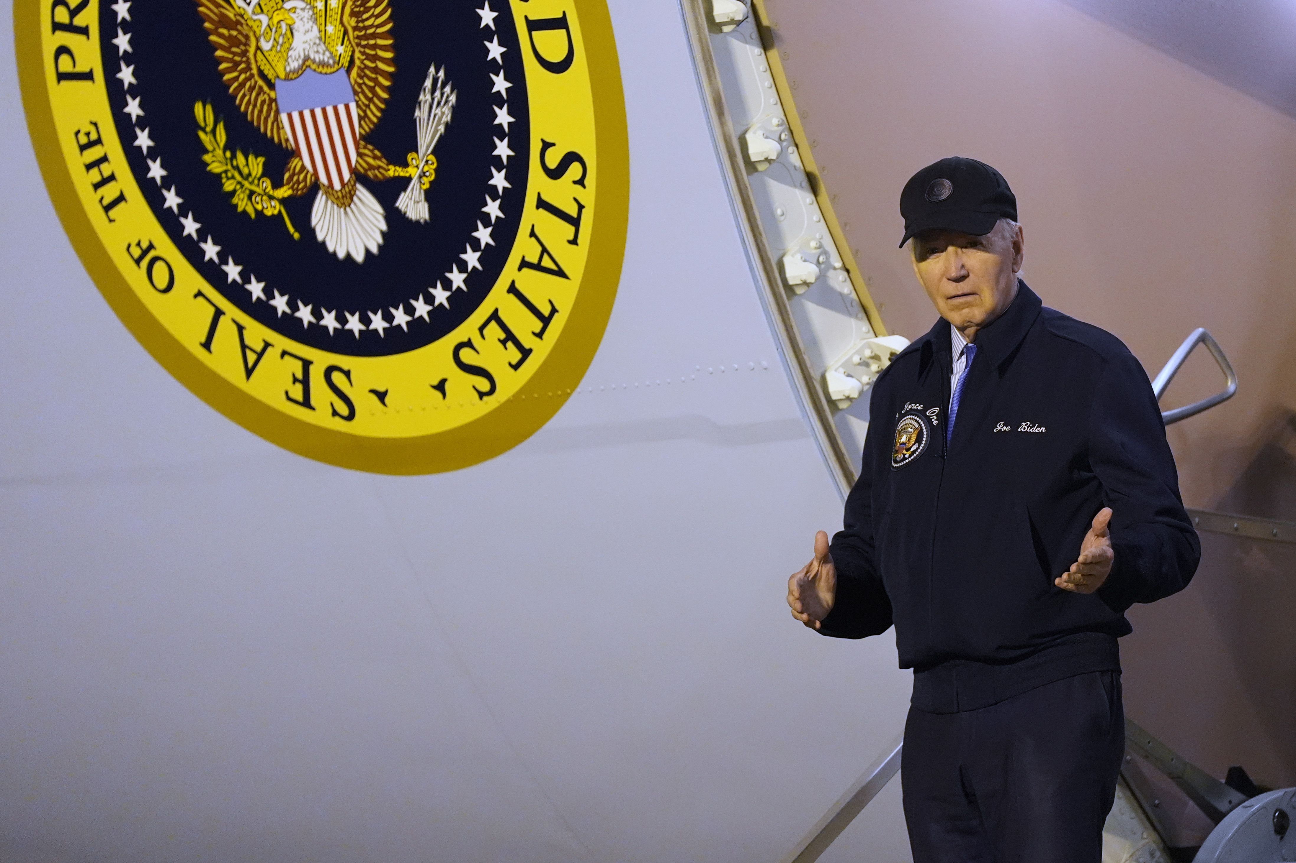 President Biden steps off Air Force One at Dover Air Force Base in Delaware last night.