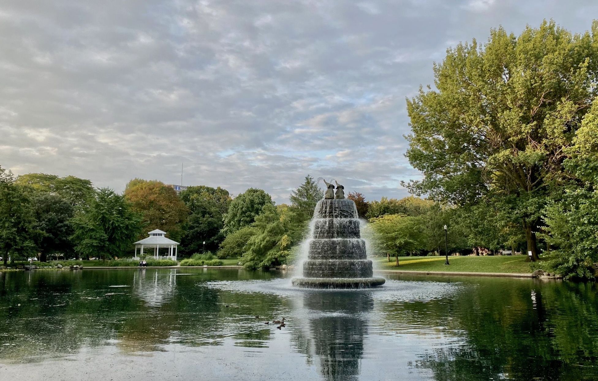 The Goodale Park fountain in a pond, with two elephants on top