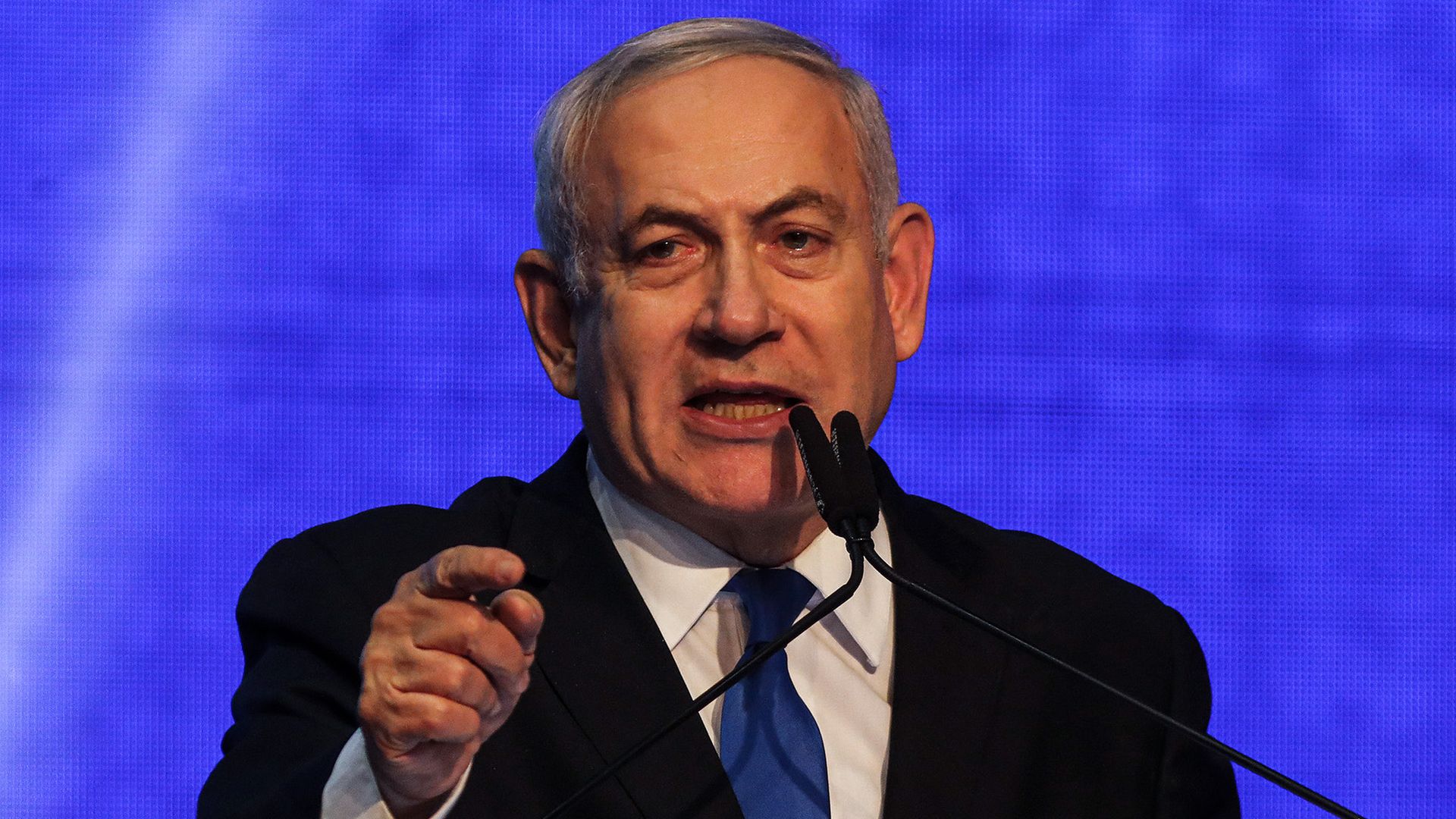 Israeli Prime Minister Benjamin Netanyahu delivers a speech to supporters of his Likud party after polls closed in the Israeli parliamentary elections. 