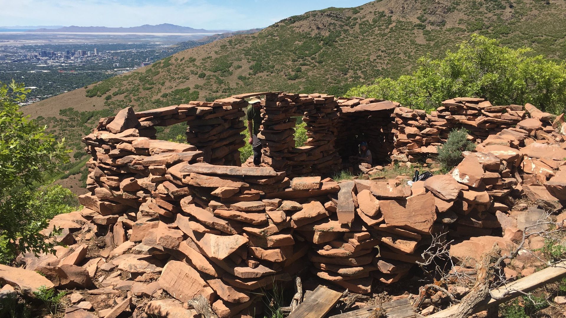 A fort of rocks on a mountain slope. 