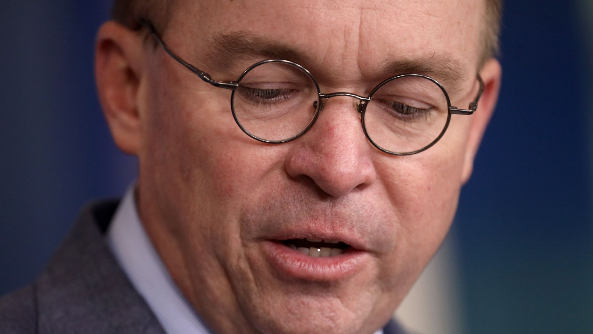 An extreme close-up on Mick Mulvaney.