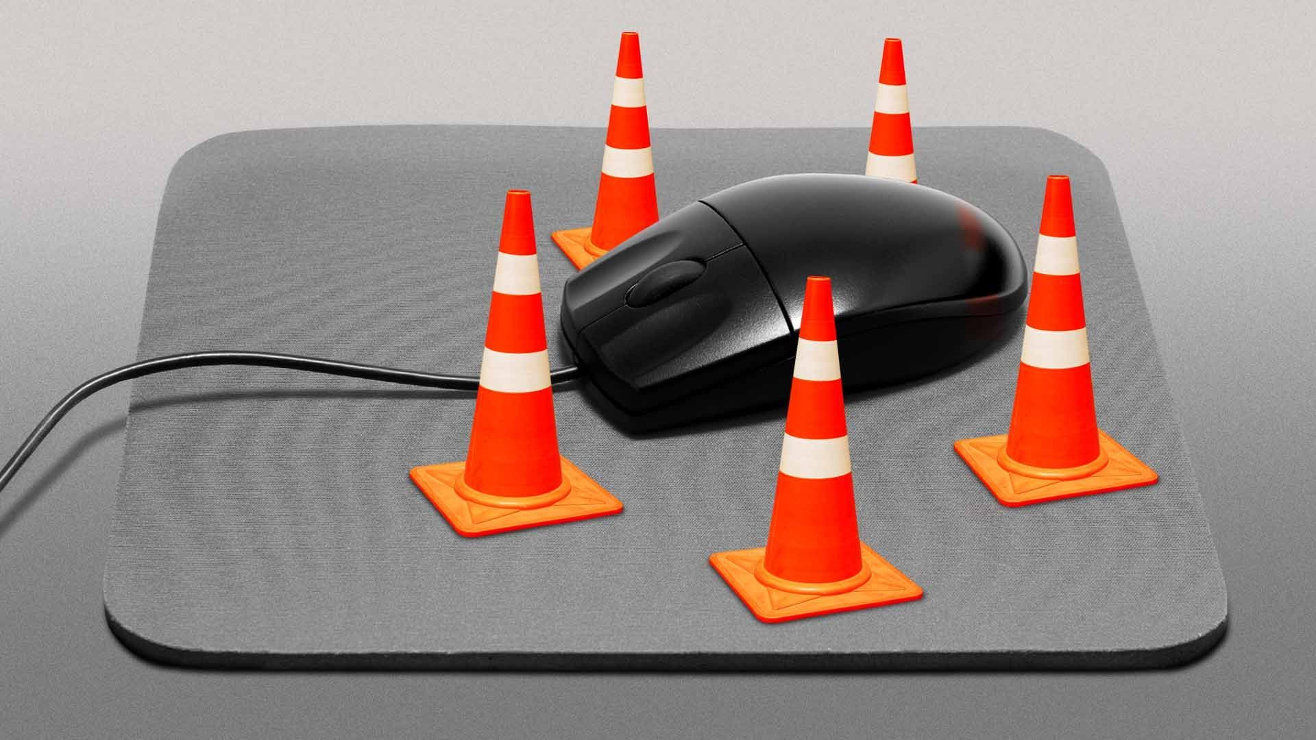 Illustration of a computer mouse surrounded by traffic cones