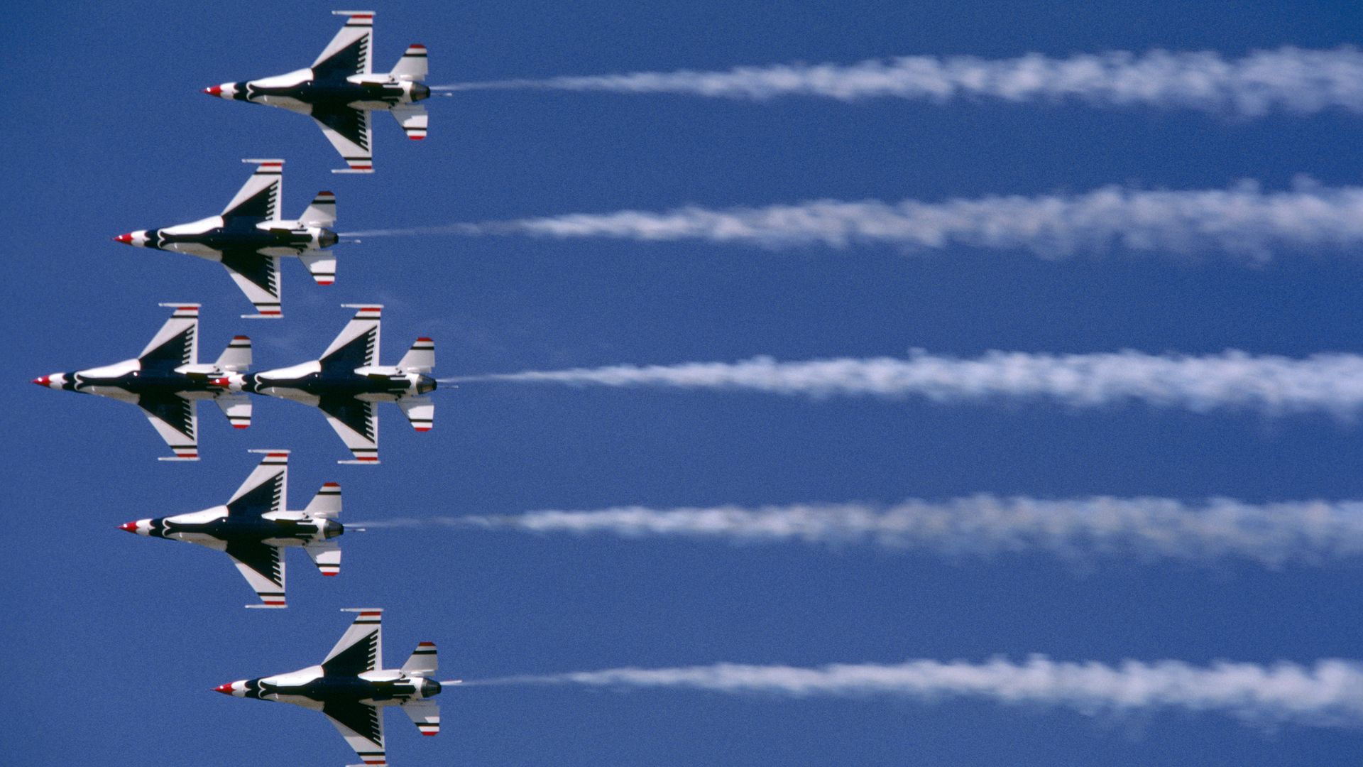 U.S. Air Force Thunderbirds fly in unison. 