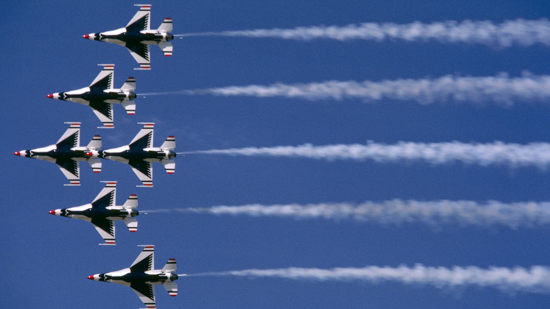 U.S. Air Force Thunderbirds fly in unison.