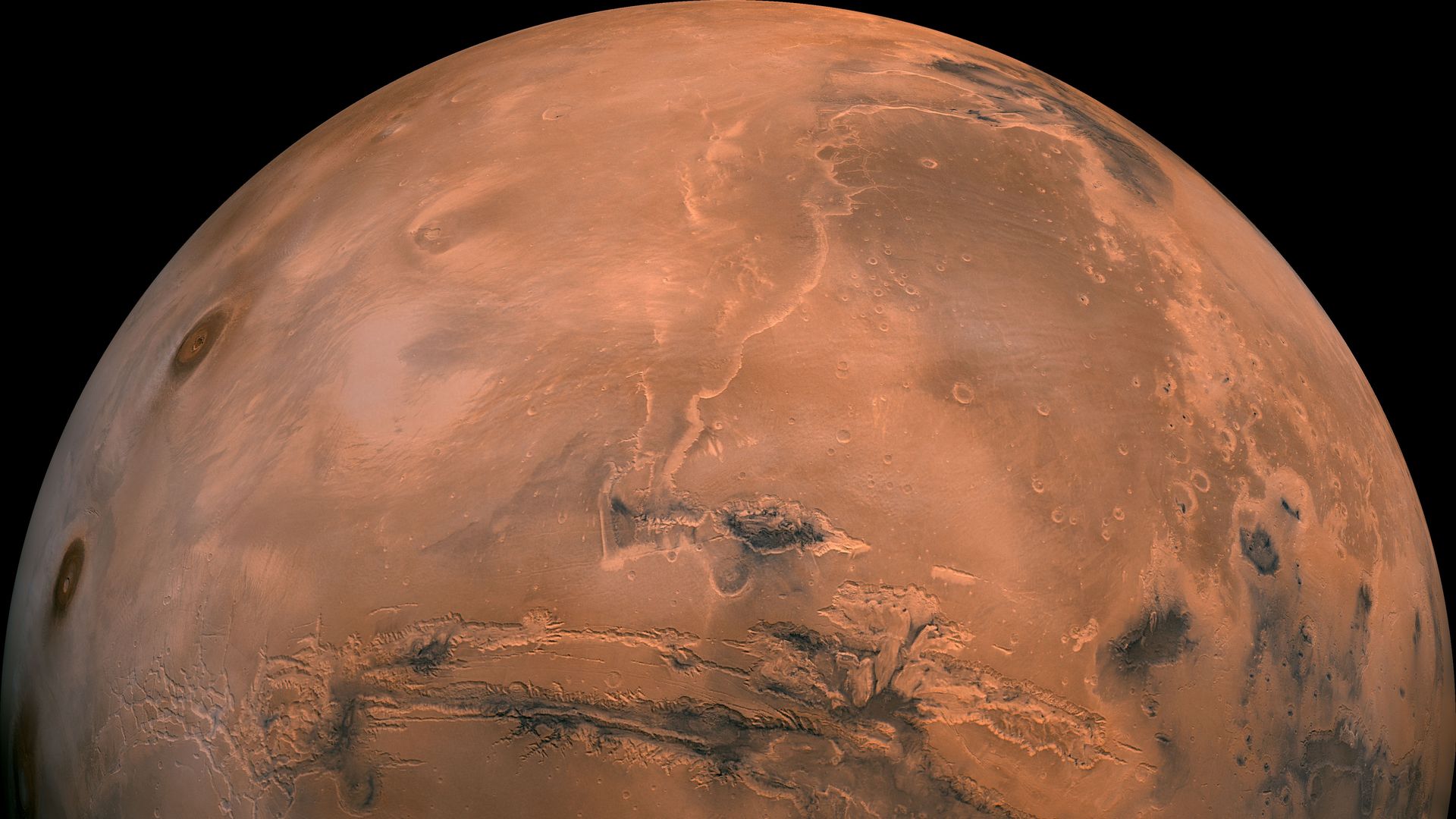 Mosaic of the Valles Marineris hemisphere of Mars projected into point perspective, a view similar to that which one would see from a spacecraft. 