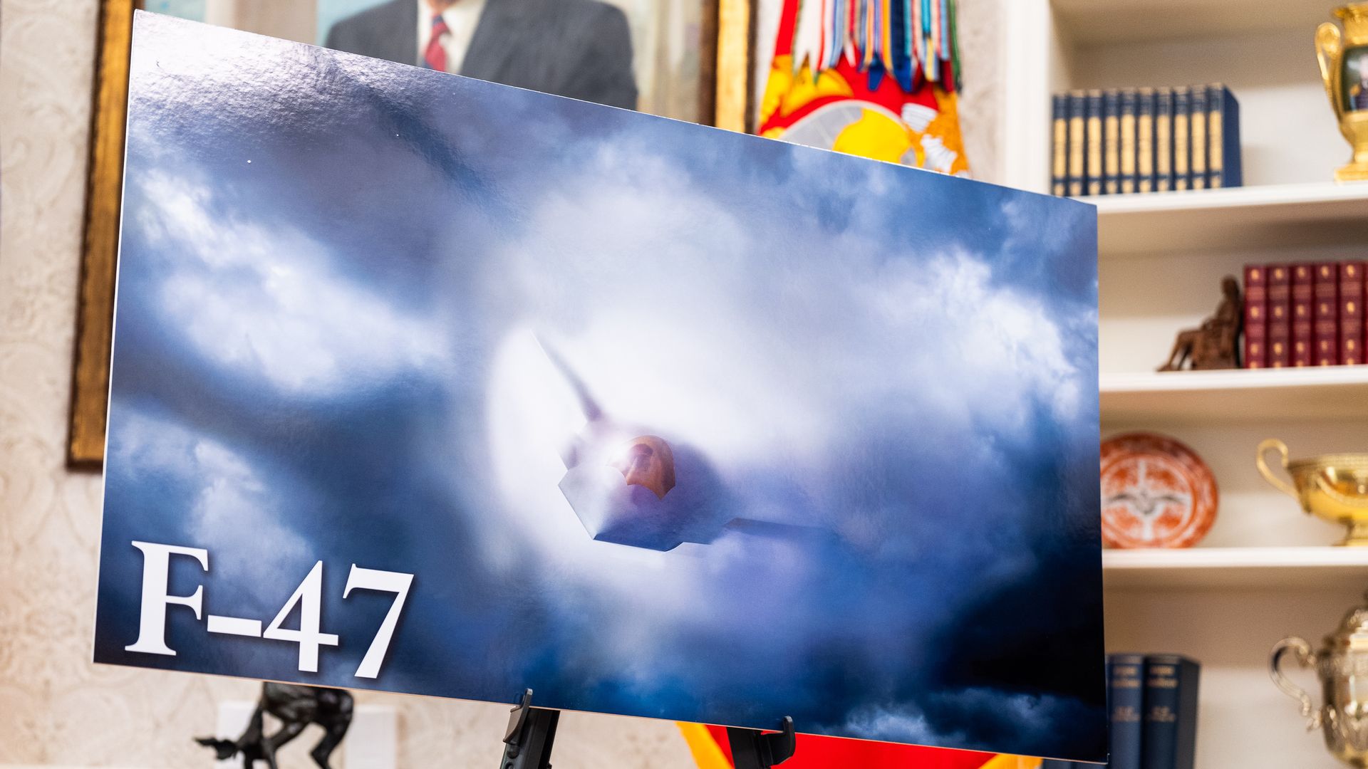An artist's rendering of the F-47 futuristic fighter jet, posted in the Oval Office.