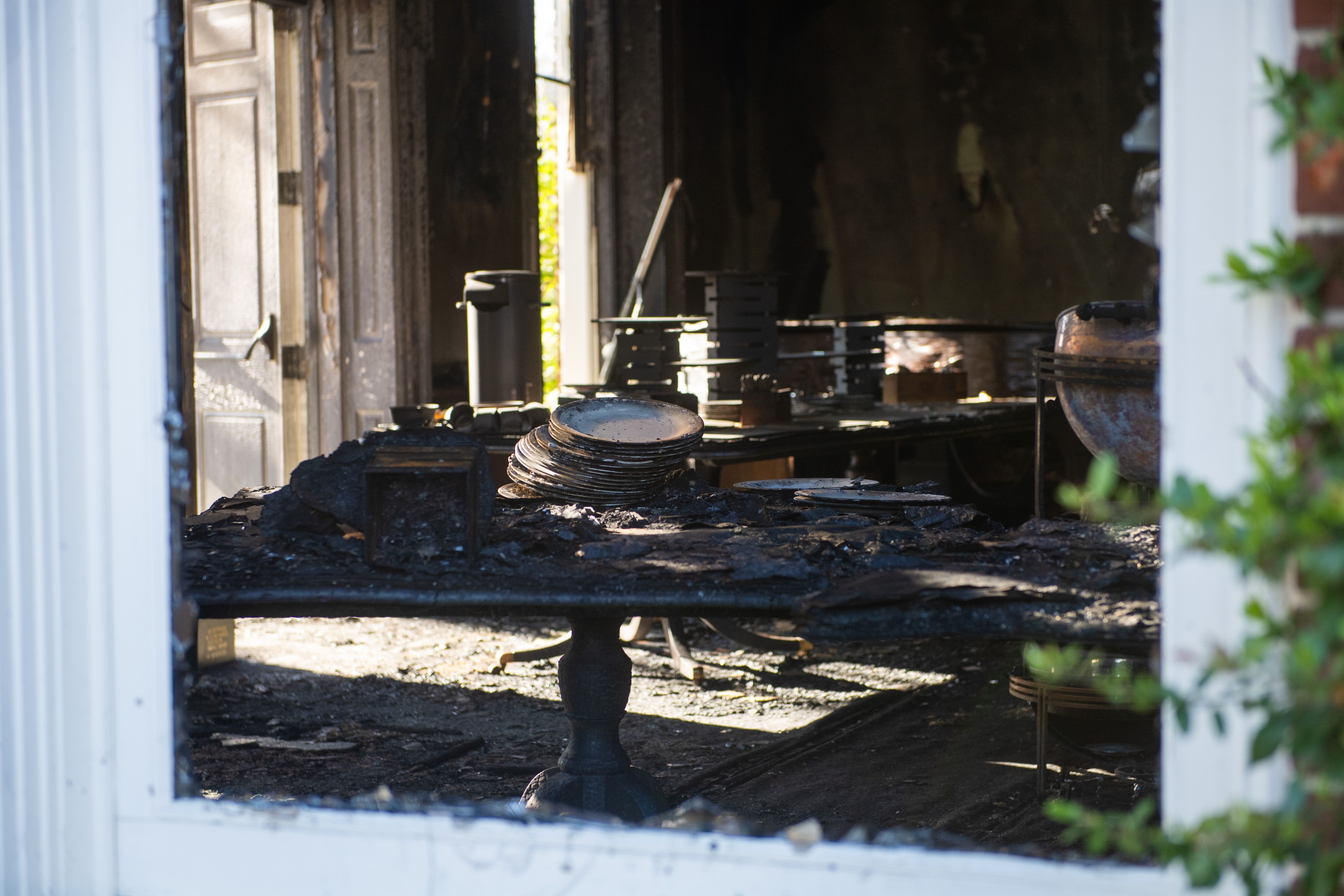 Extensive fire damage to the Pennsylvania Governor's Mansion and Gov. Josh Shapiro's residence is seen during a press conference on April 13, 2025 in Harrisburg, Pennsylvania. 