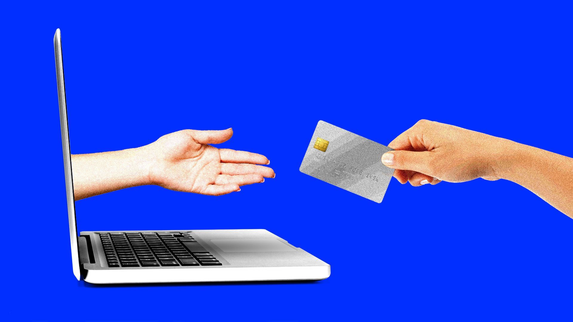 A hand extending from a laptop screen reaches for a credit card