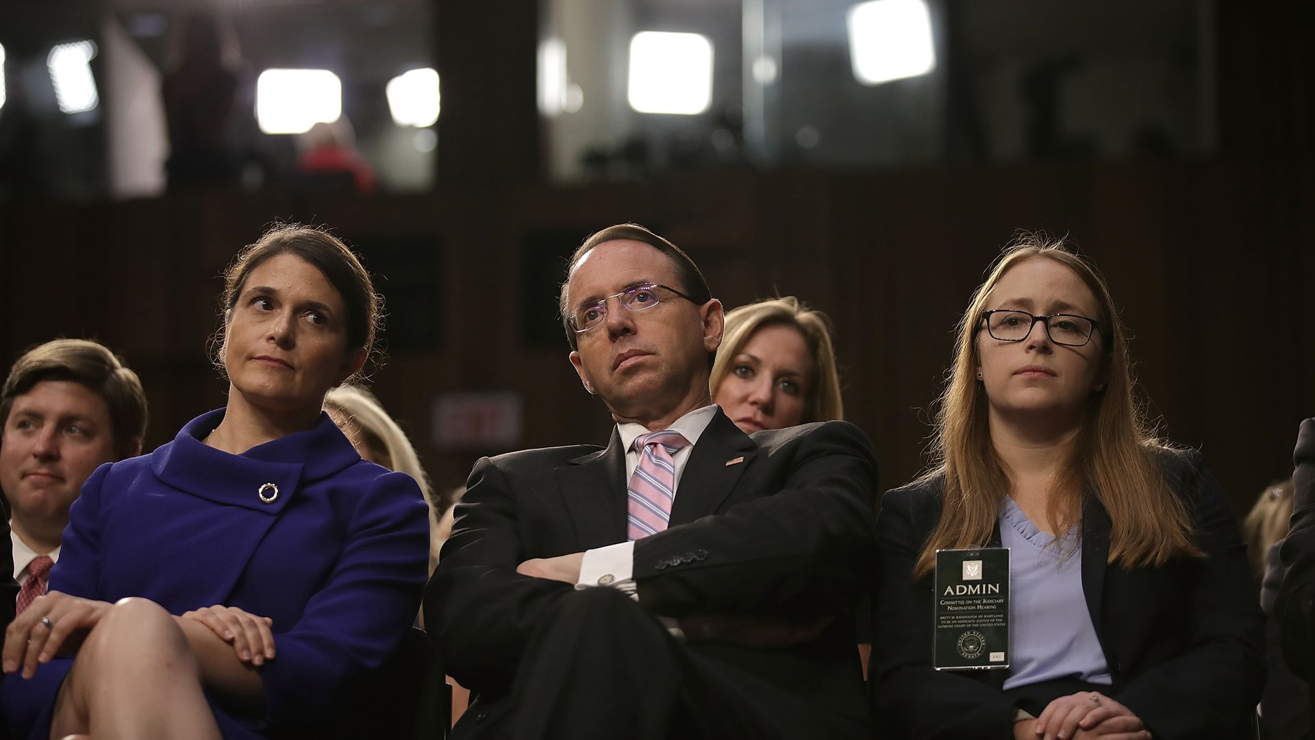 Deputy Attorney General Rod Rosenstein sitting in a hearing with his arms crossed leaning backwards. 