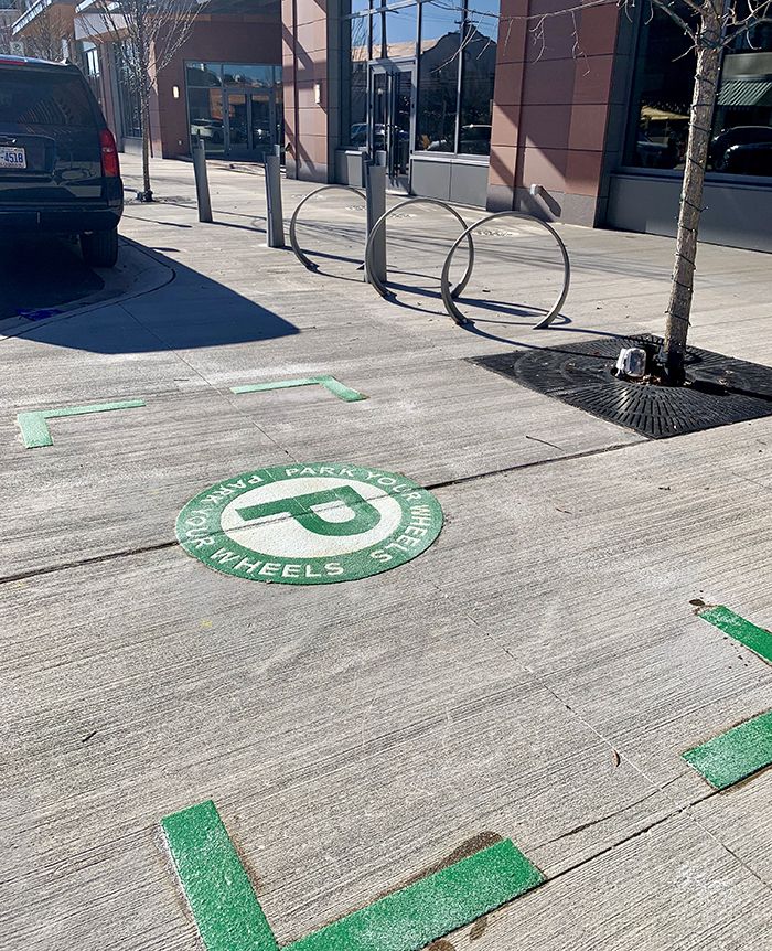 e-scooter corral in South End in front of Dimensional Place