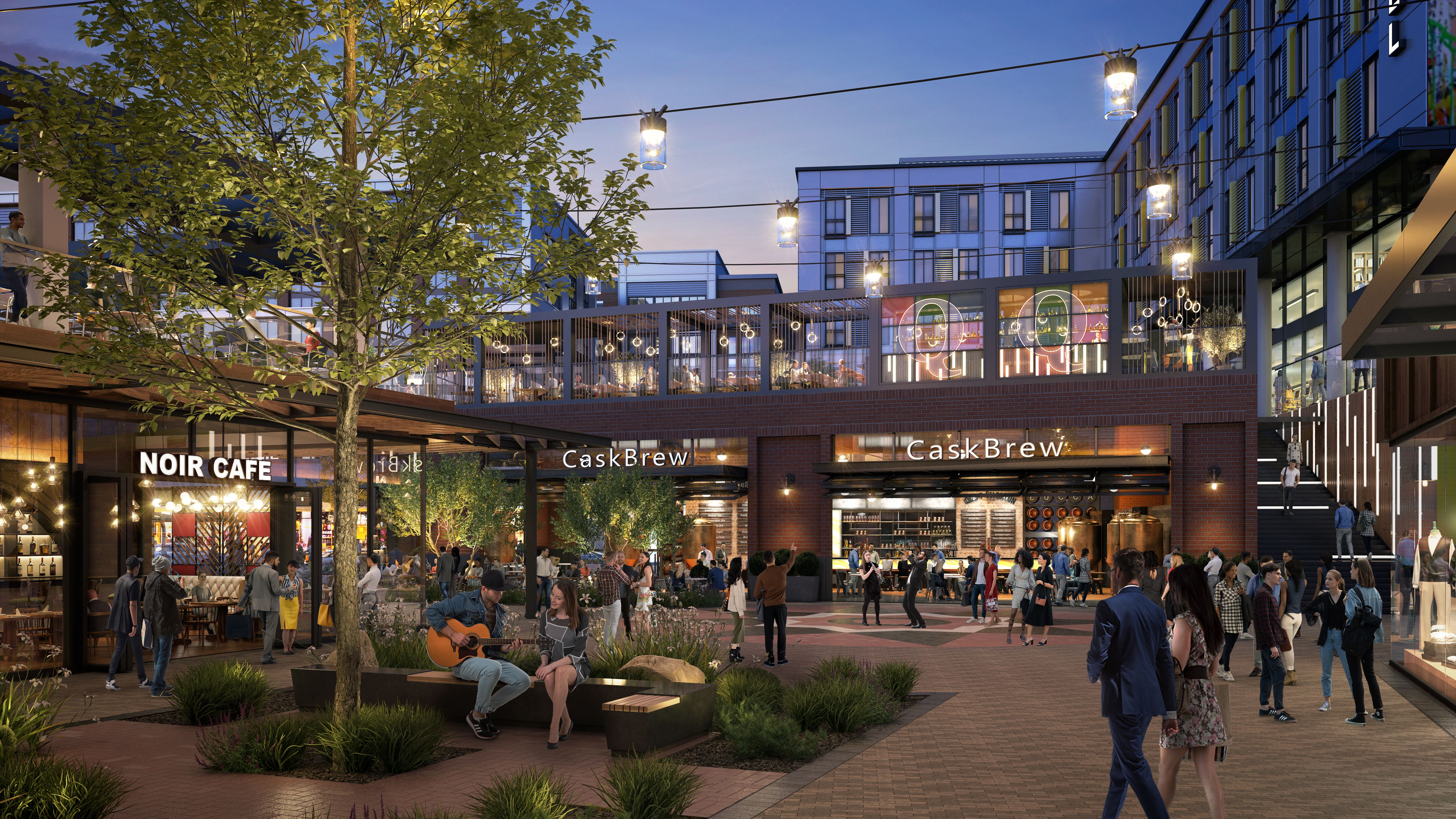 Rendering if a courtyard of a mall at nighttime with people walking around and sitting down.