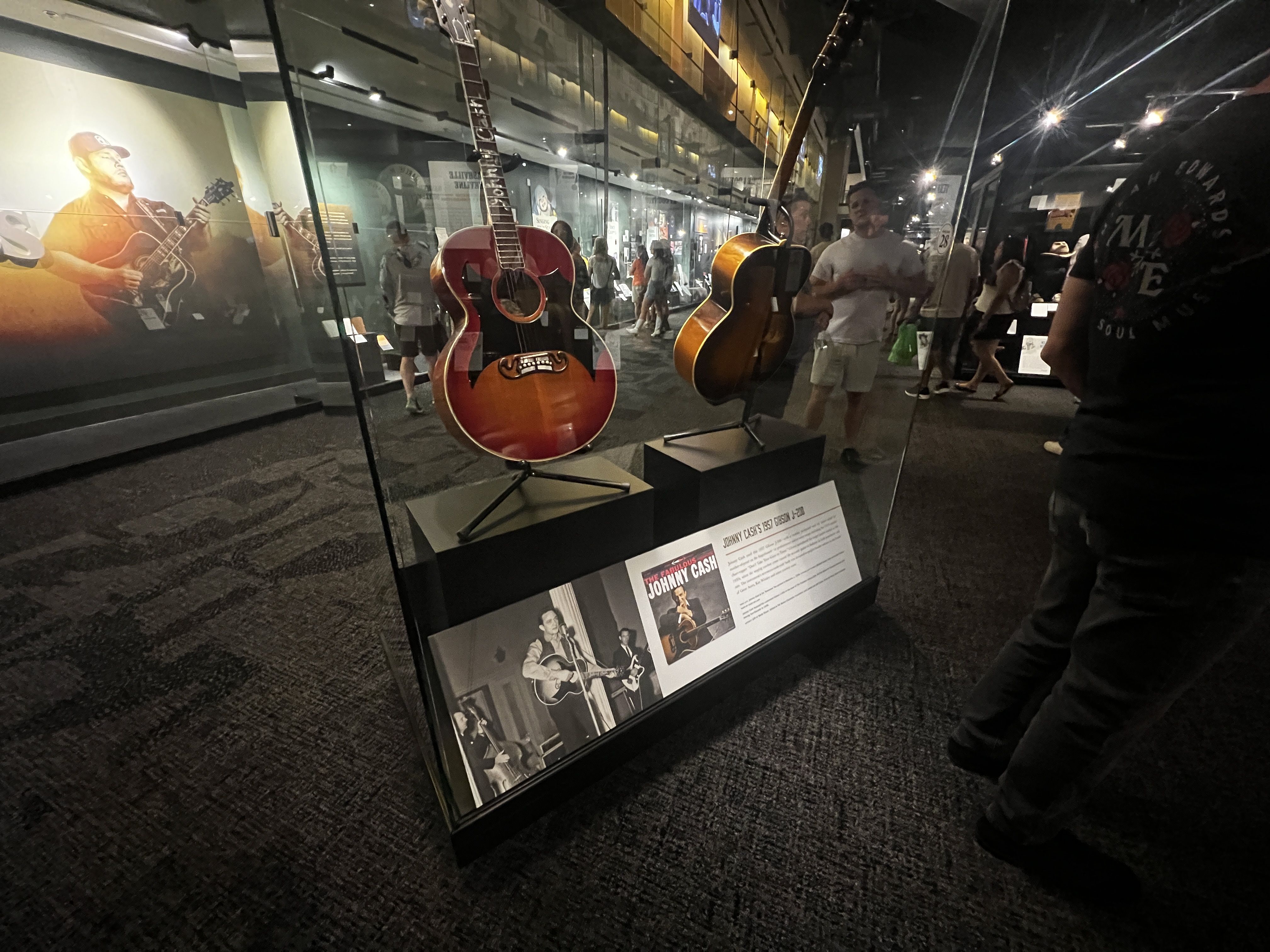 Johnny Cash guitars in a glass case. 