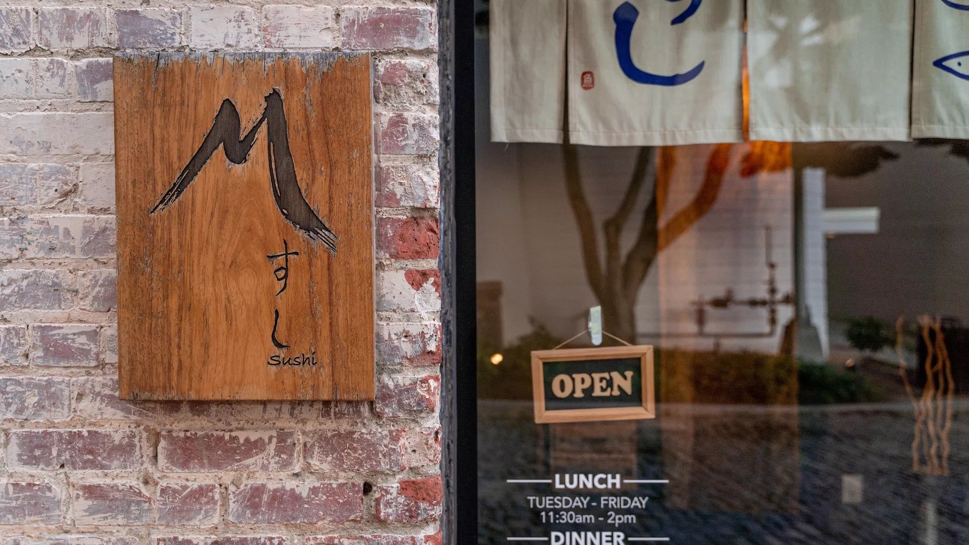 doorfront of m sushi restaurant