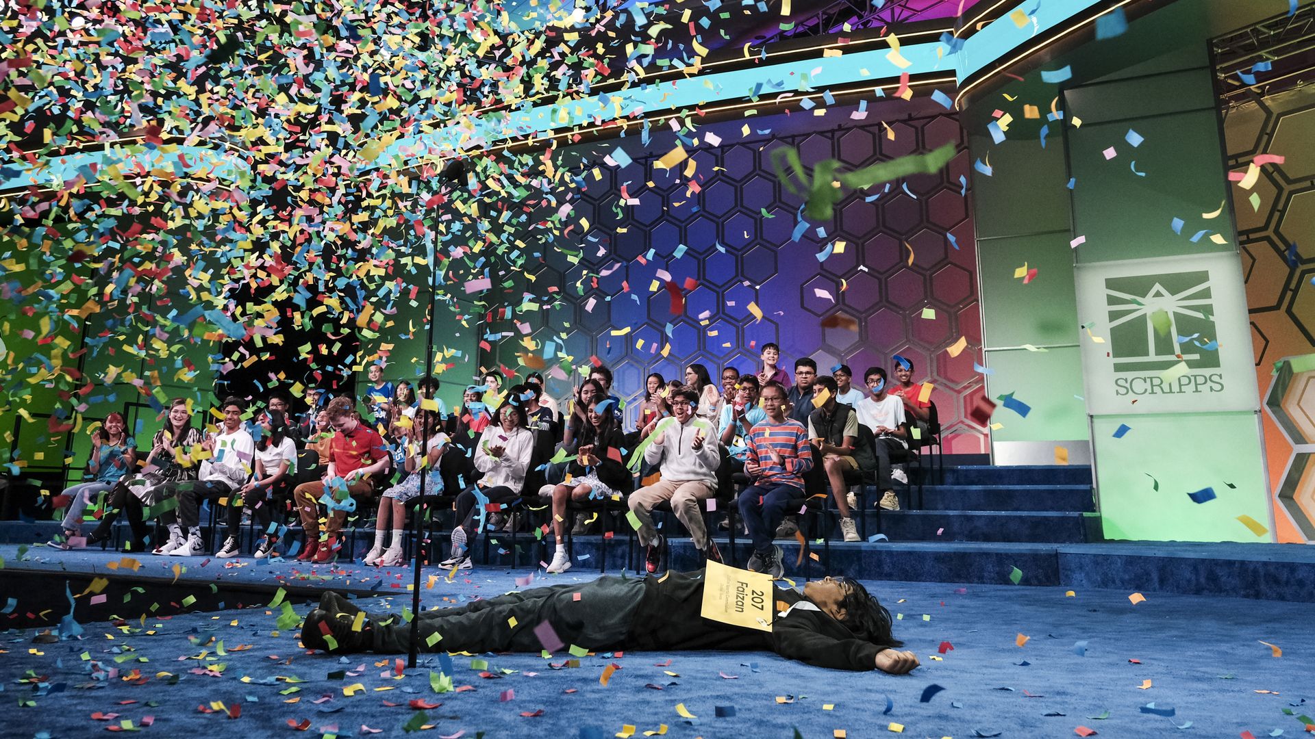 Faizan Zaki age 13 celebrates after being named the winner of the 100th 2025 Scripps National Spelling Bee