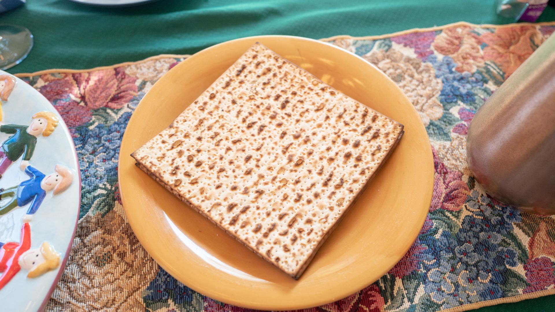 A board of matzo on a plate.