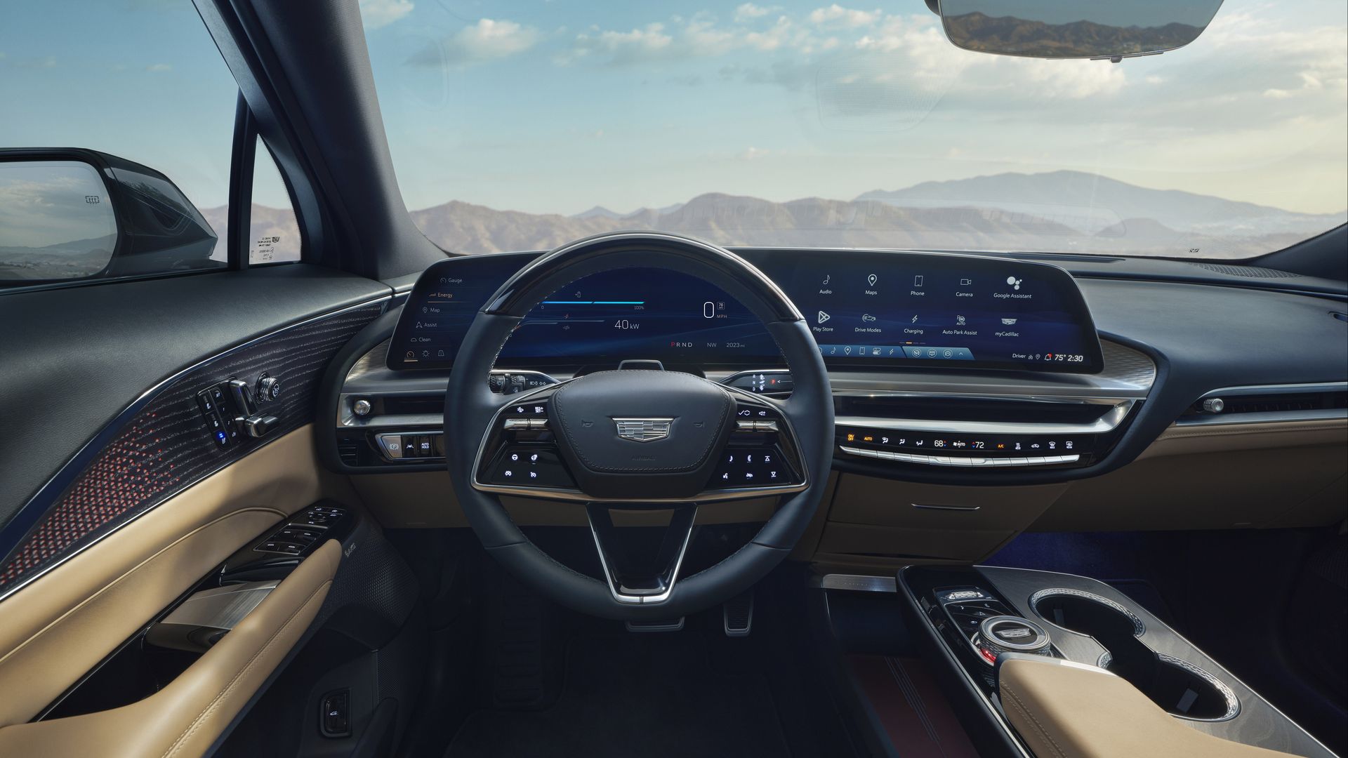 Image of the interior of the 2025 Cadillac Lyriq, showing a futuristic, 33-inch curved dashboard display. 