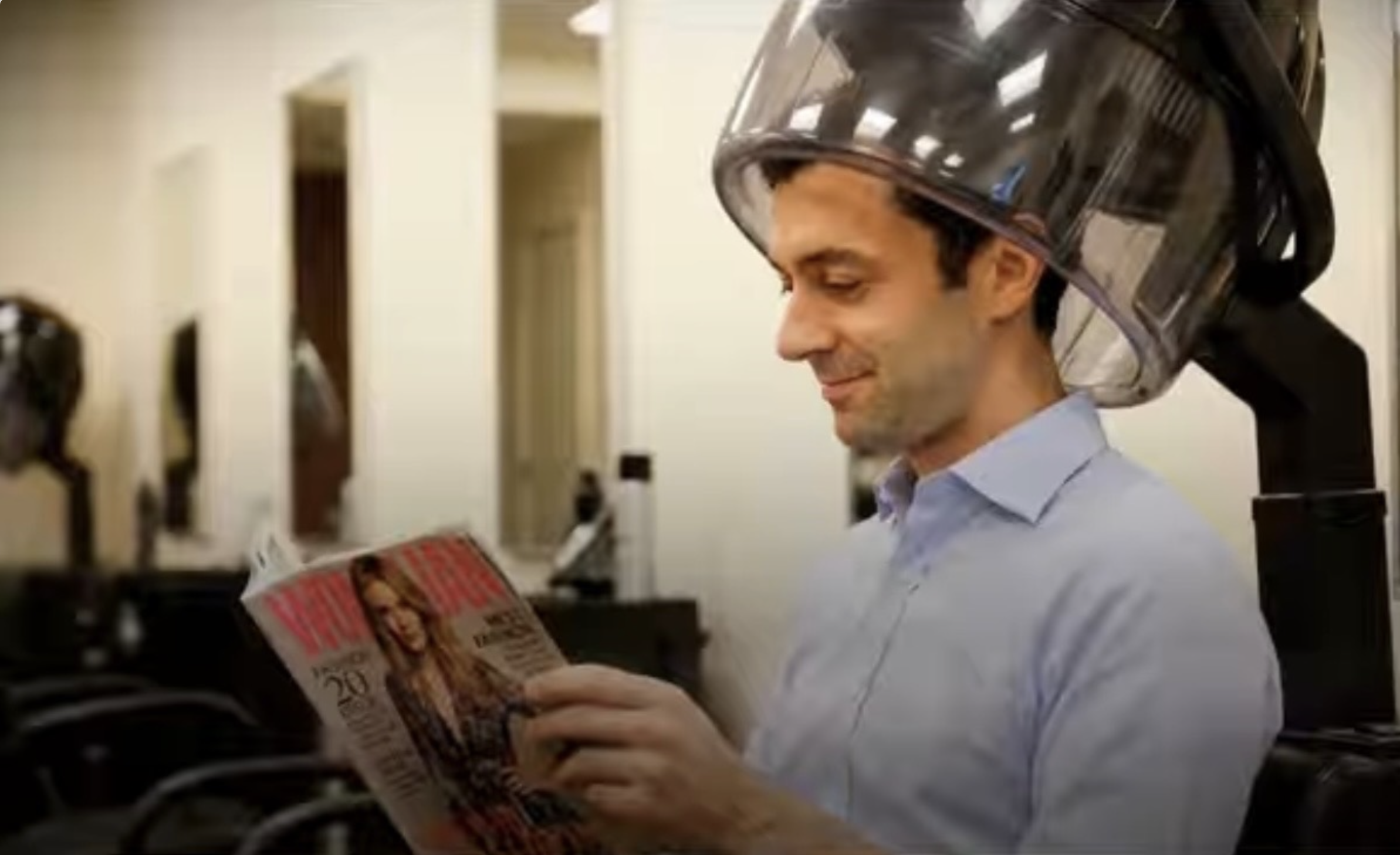 AI image depicts Ossoff under a hair dryer, reading Vanity Fair