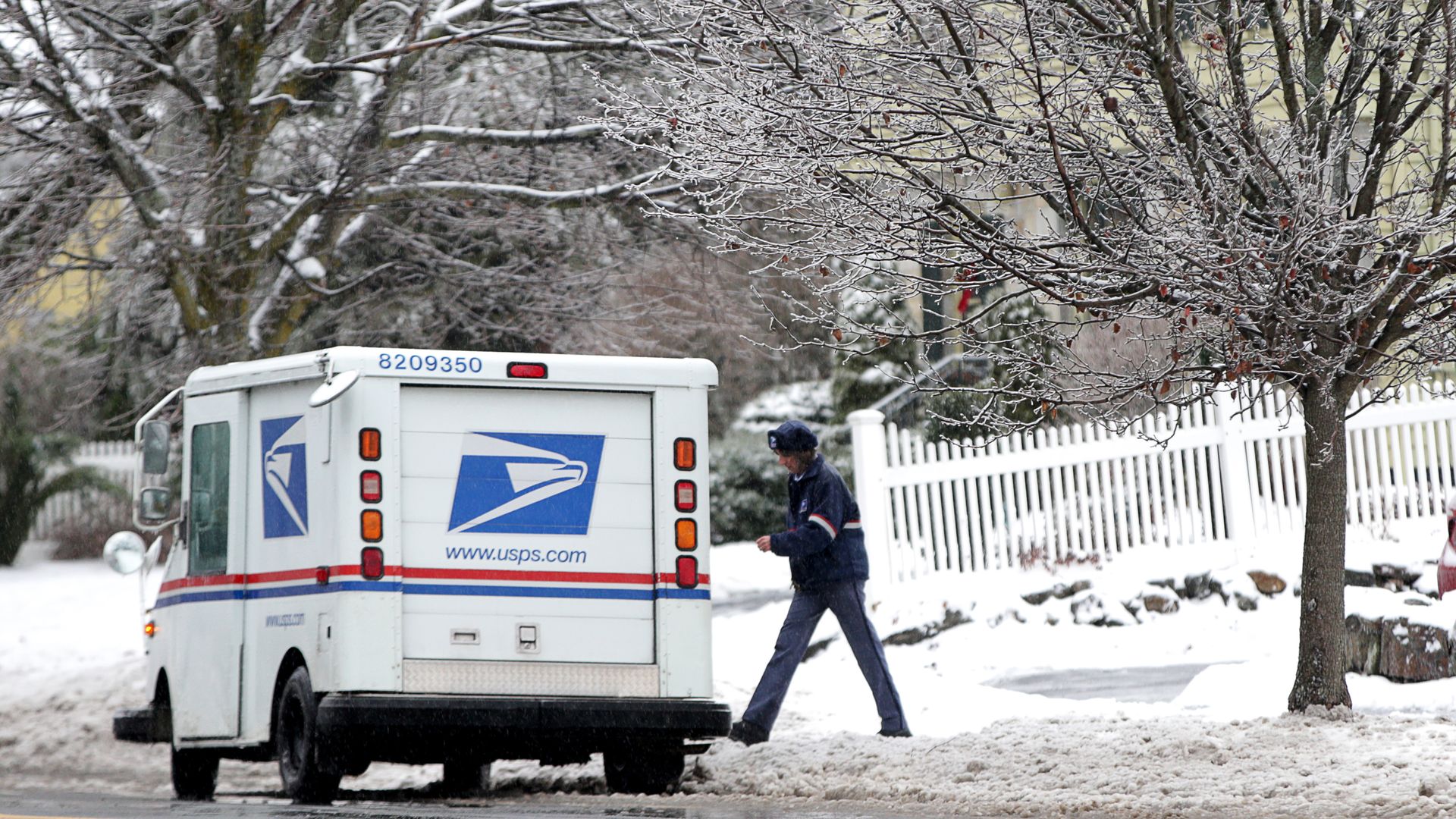 A United States Postal Service mail carrier.