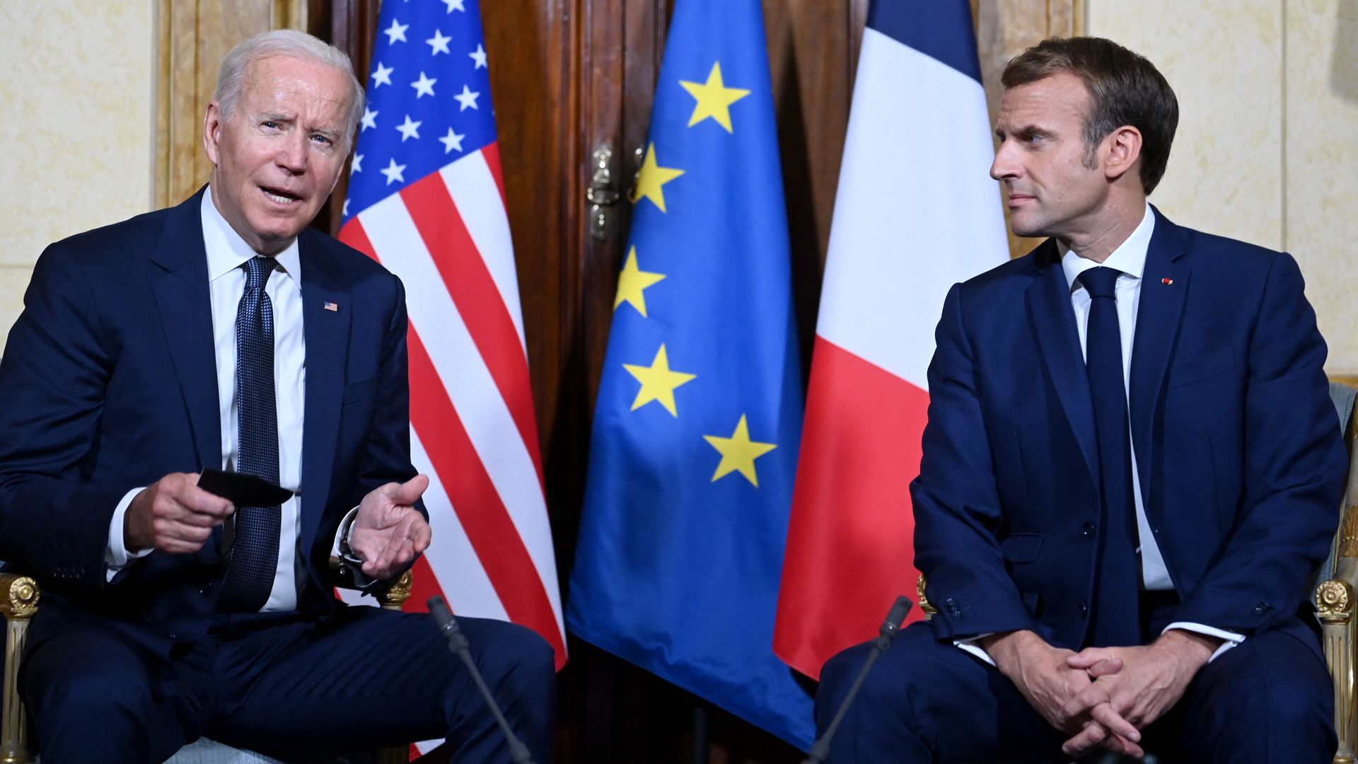  French President Emmanuel Macron (R) and US President Joe Biden (L) meet at the French Embassy to the Vatican in Rome on October 29.