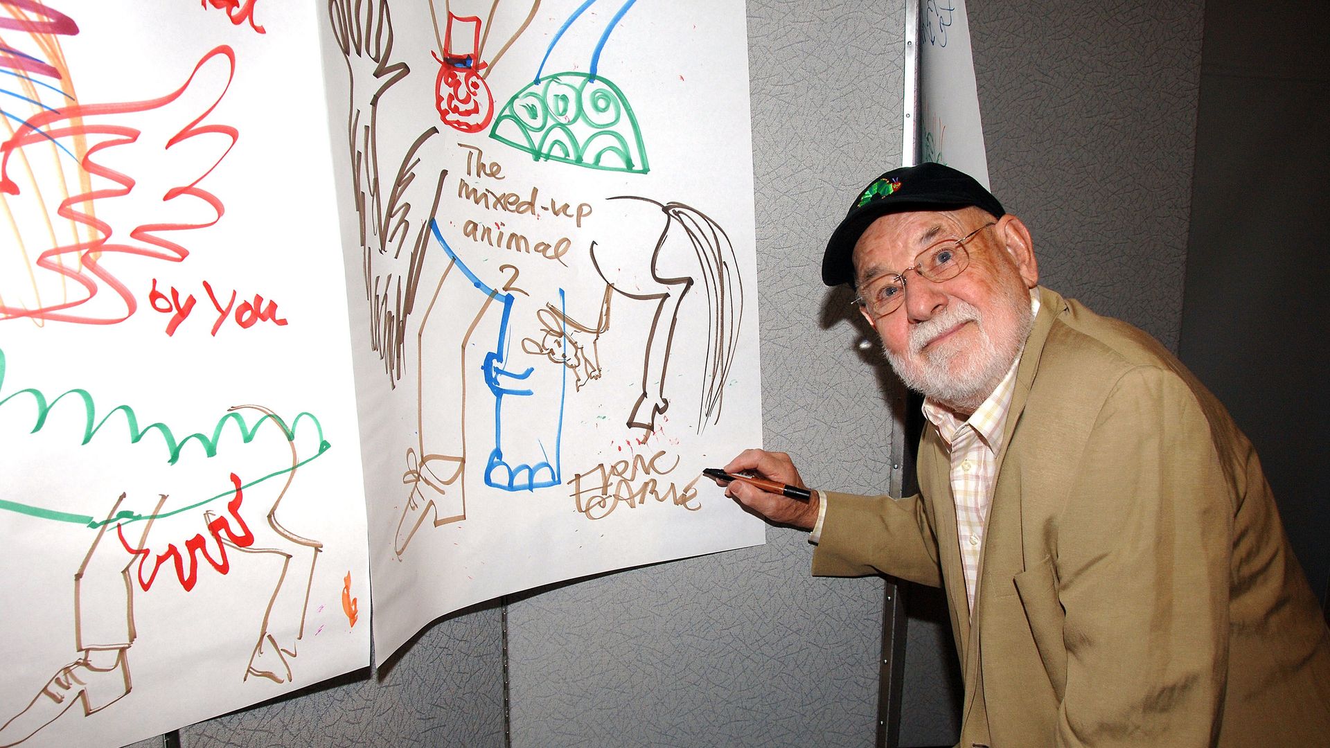 Author Eric Carle draws during his reading to children from his book at Morgan Stanley Children's Hospital of New York Presbyterian 