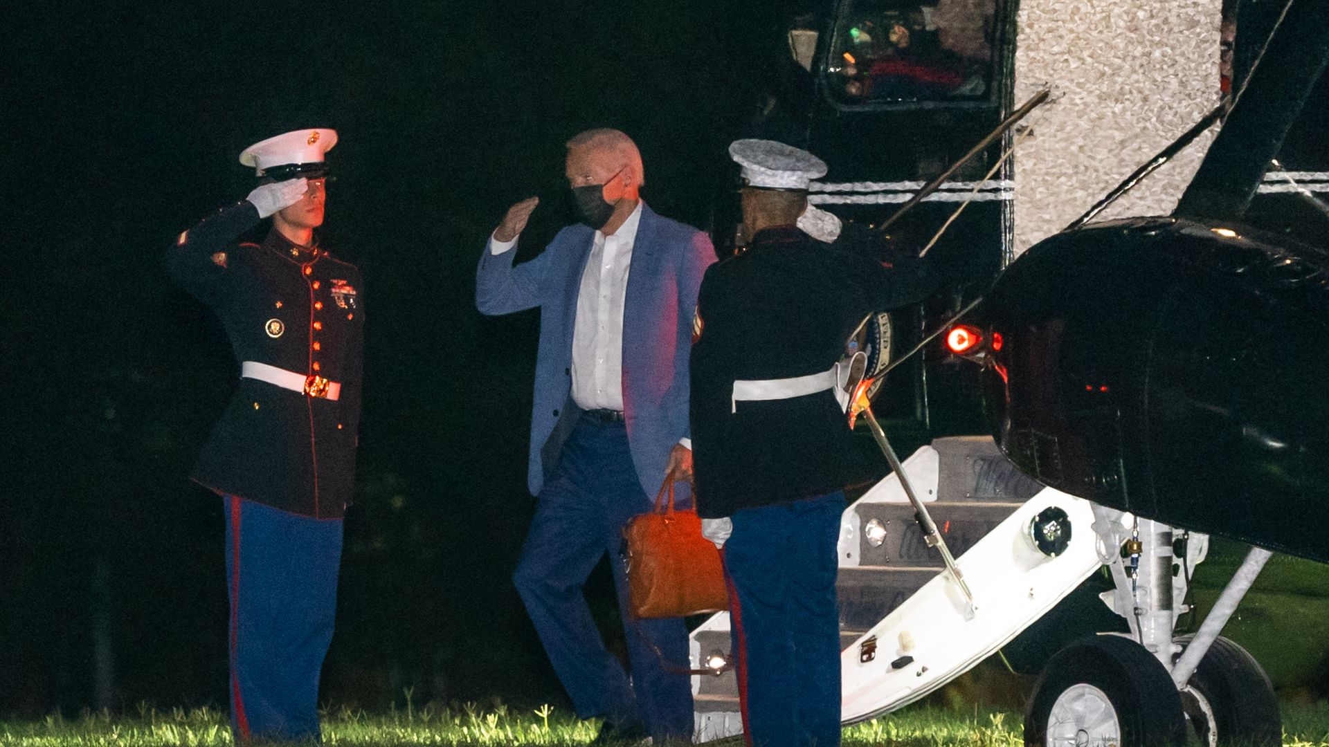Biden saluting Marines