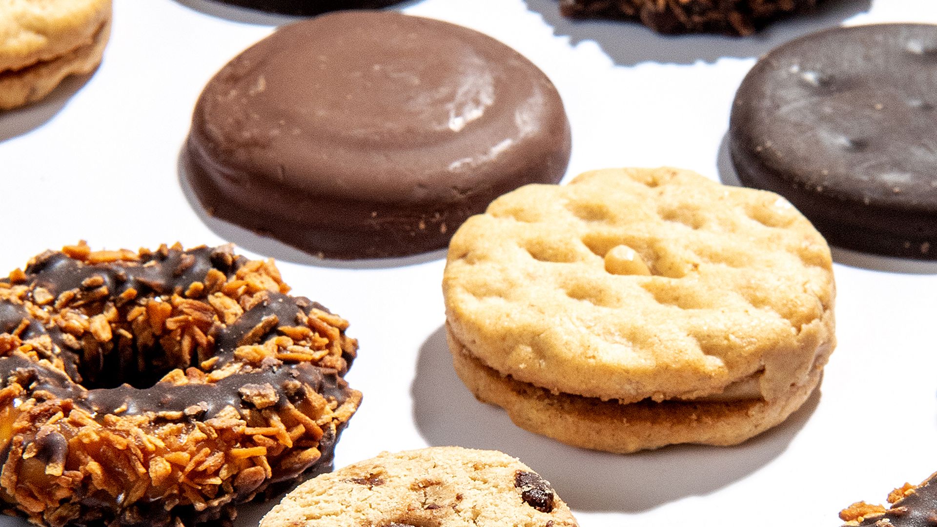 An assortment of Girl Scout cookies on a table.