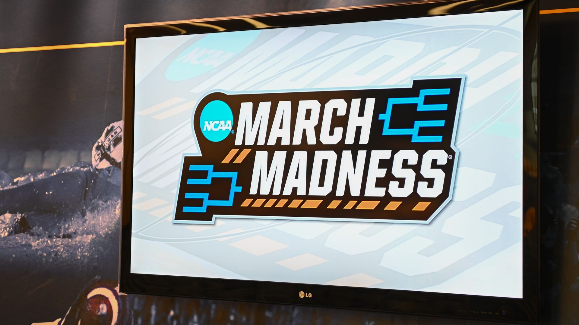 March Madness logo on a TV screen