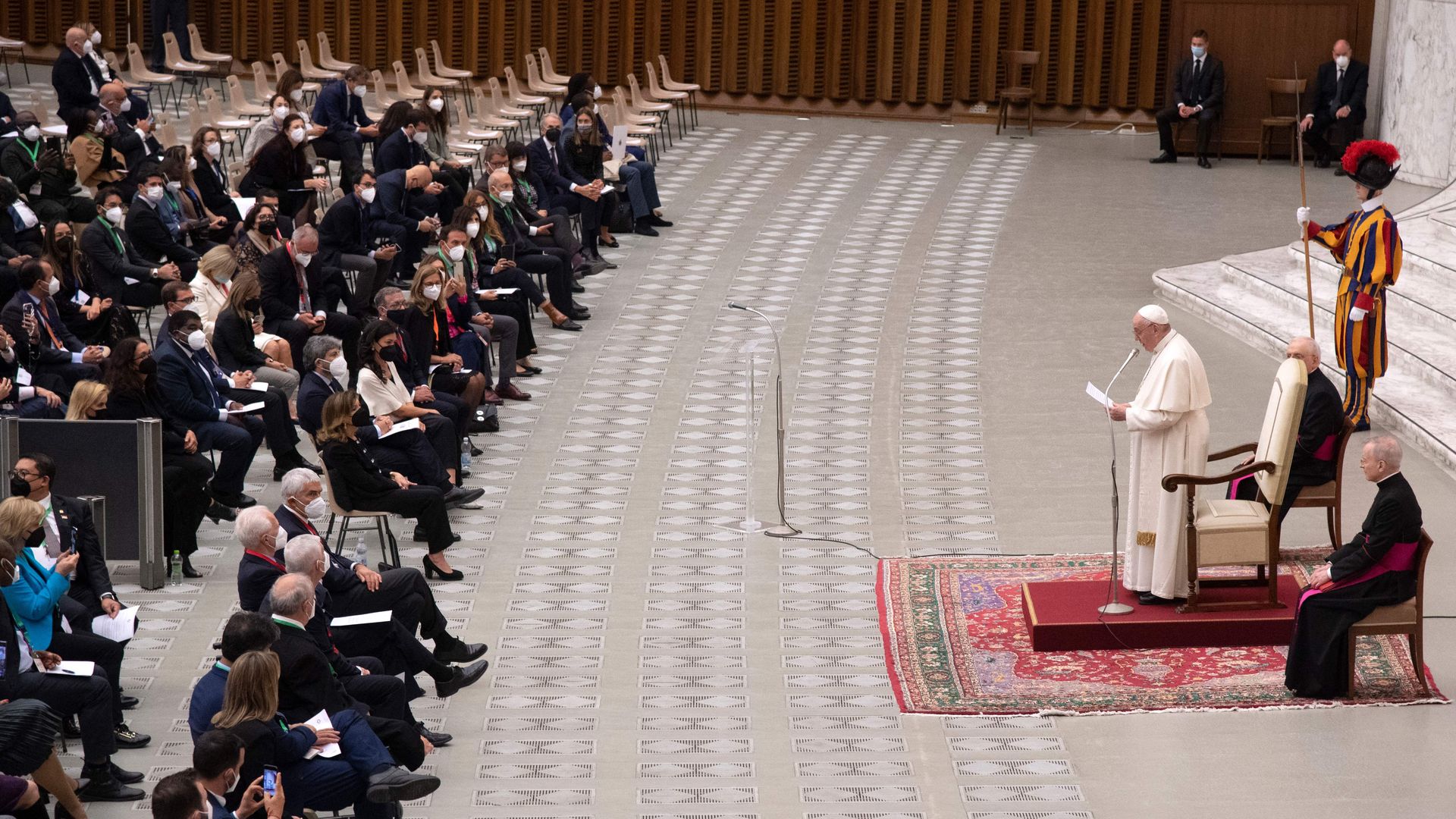 Pope Francis (2ndR) speaks during an audience with the participants of the preparatory Interparliamentary Meeting for COP 26, in Paul VI hall at the Vatican on October 9, 2021. (