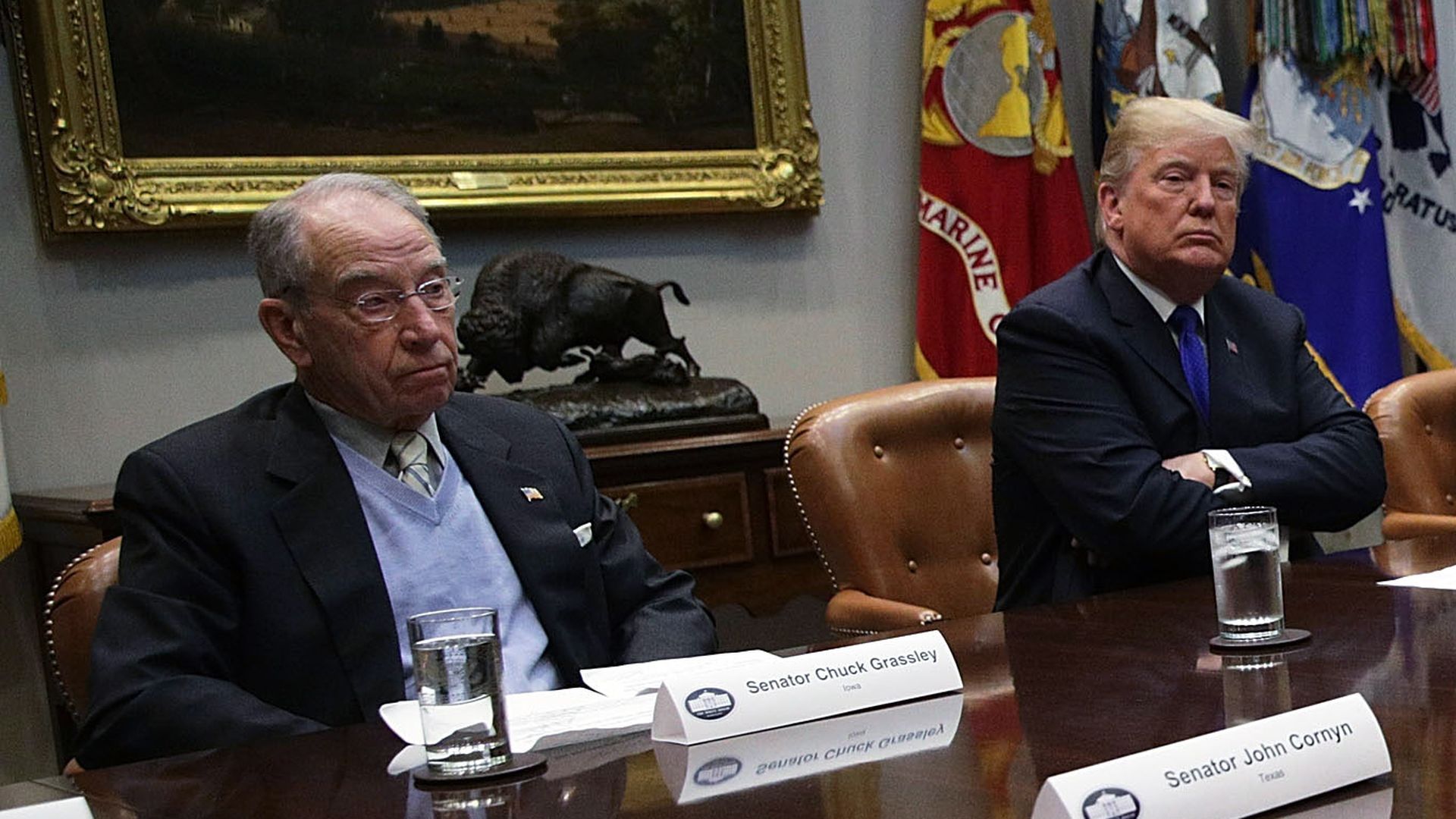 Donald Trump and Chuck Grassley seated next to each other.