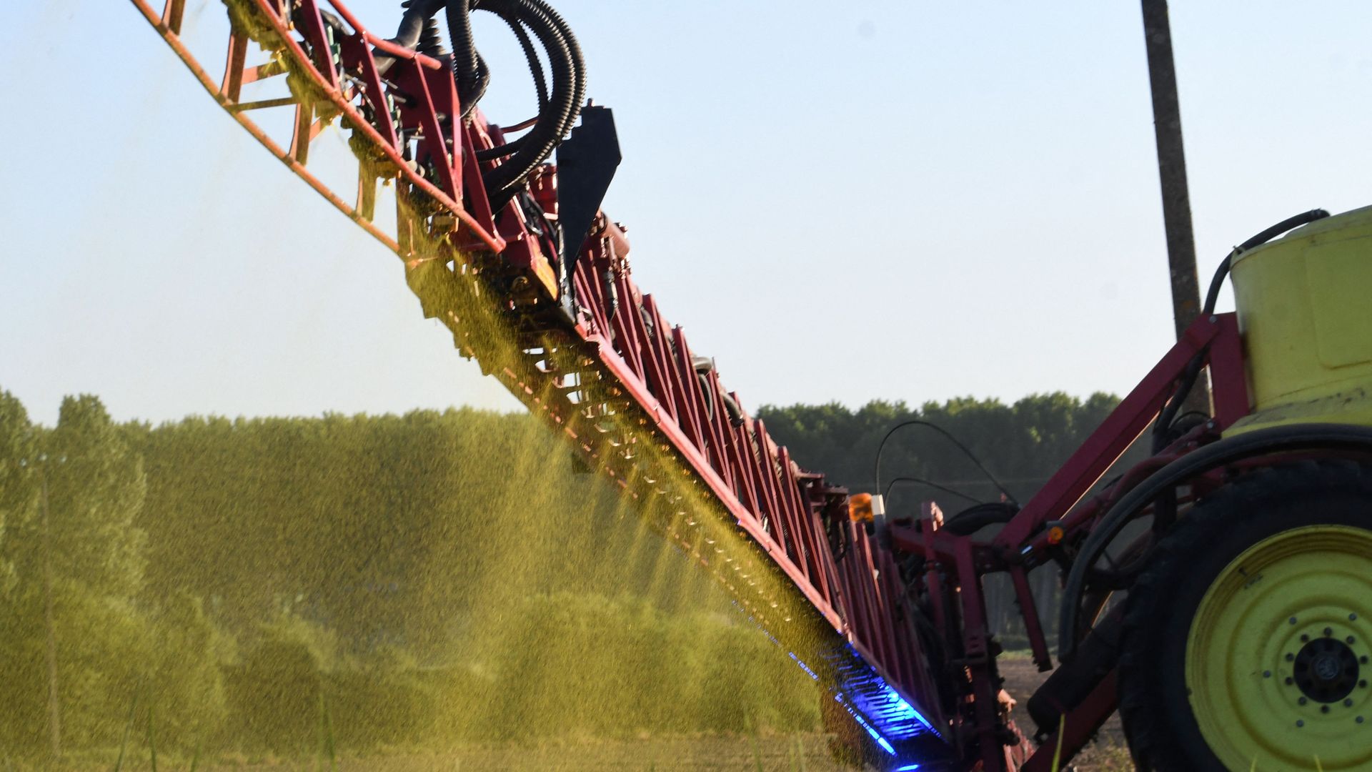 A tractor spraying chemicals on crops in Piace, France, in May 2018.