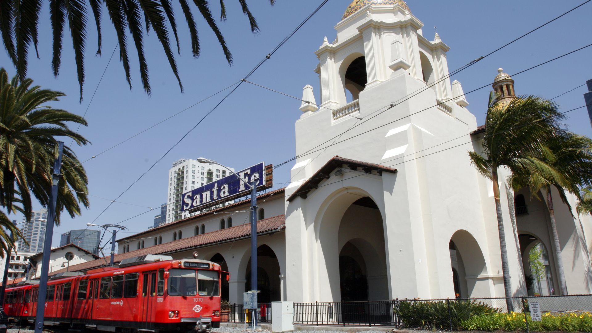 a trolley pulling out of the Santa Fe Depot