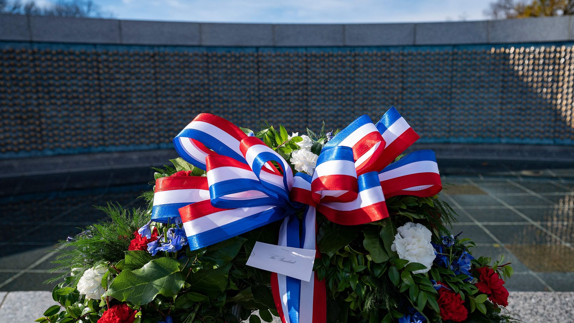 A Pearl Harbor commemoration wreath left behind by President Biden is seen at the World War II Memorial in Washington.