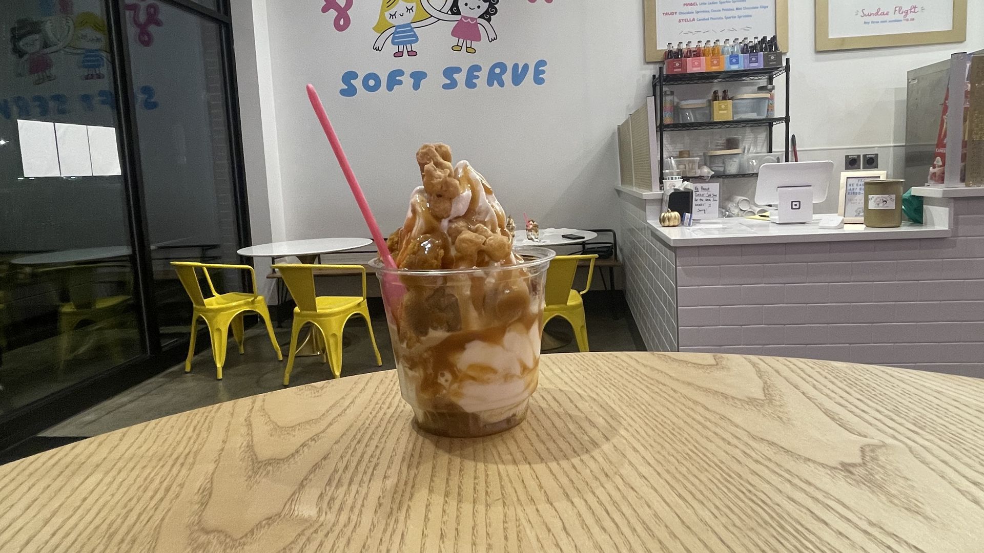 Photo of a sundae called "The Penny," a Little Ladies latest seasonal sundae featuring fall flavors of pumpkin and chai, topped with cardamom caramel sauce and homemade corn puff brittle