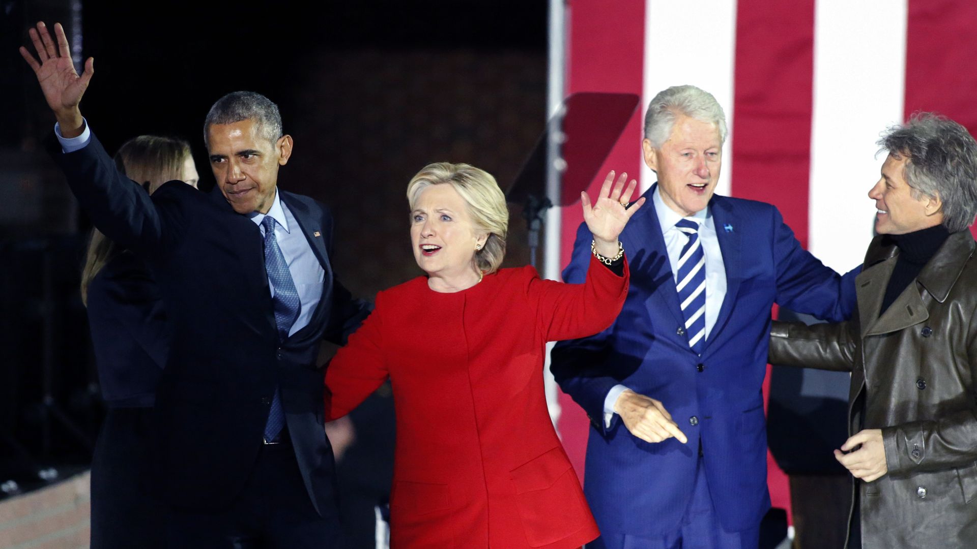 Hillary Clinton and Barack Obama on stage.