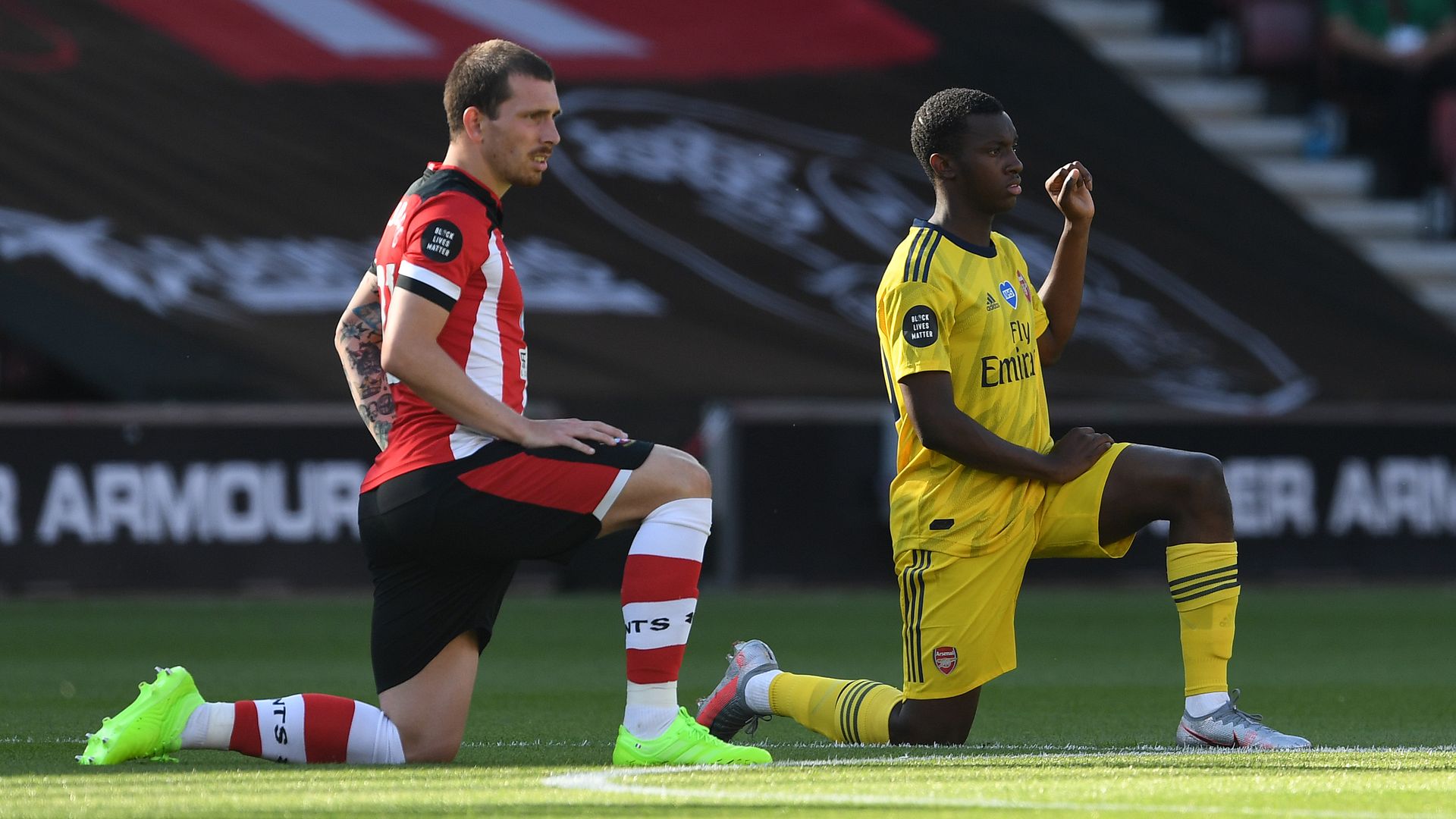 Soccer players take a knee