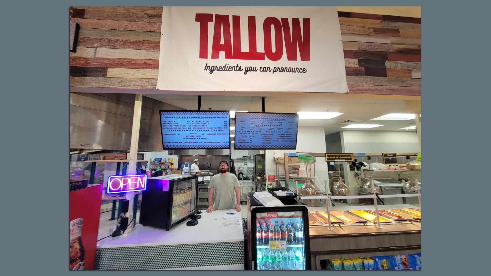 Abe Ibrahim standing under his "TALLOW" banner with the subtitle "Ingredients you can pronounce." 