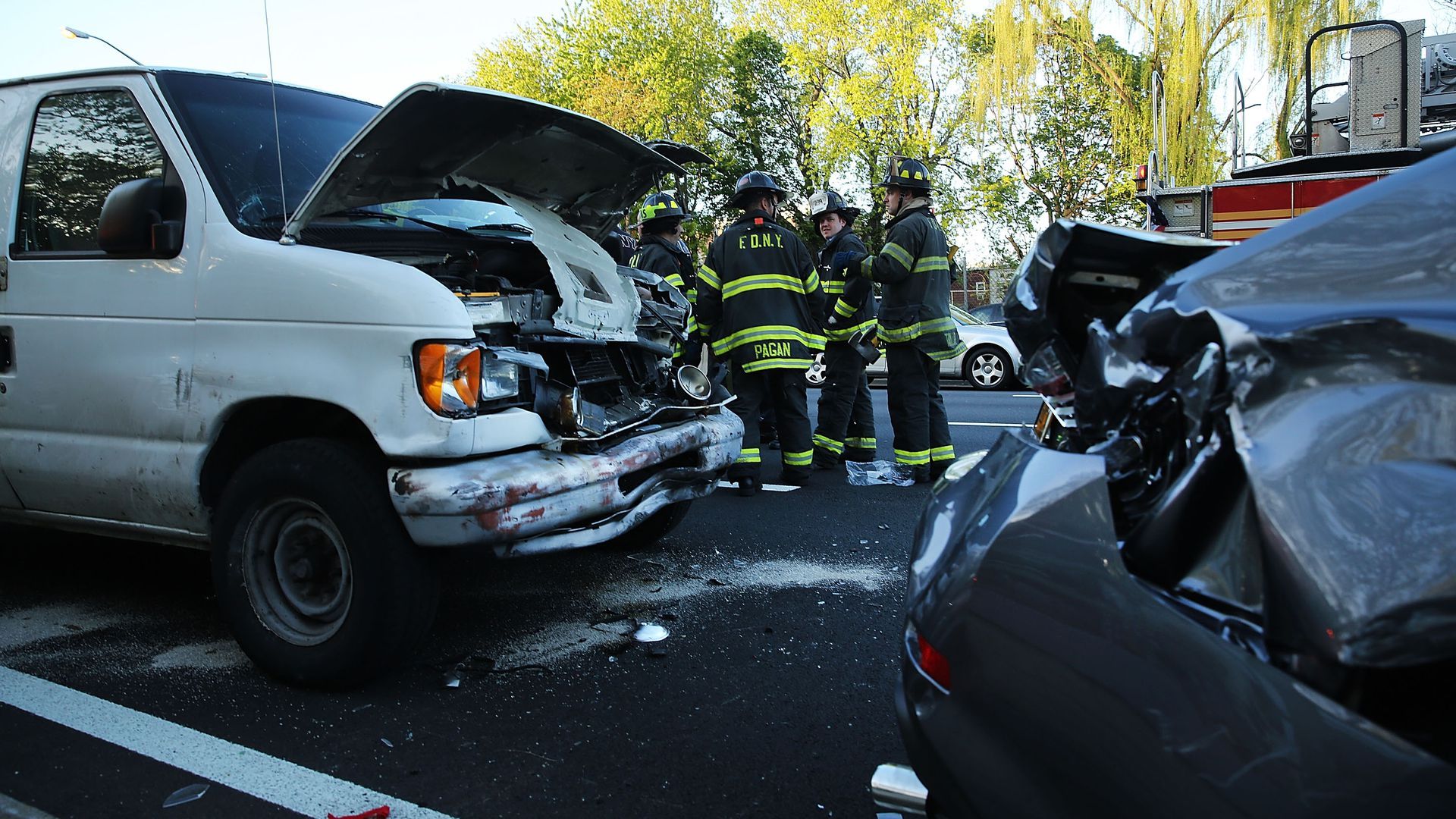 Cars damaged post-collision.