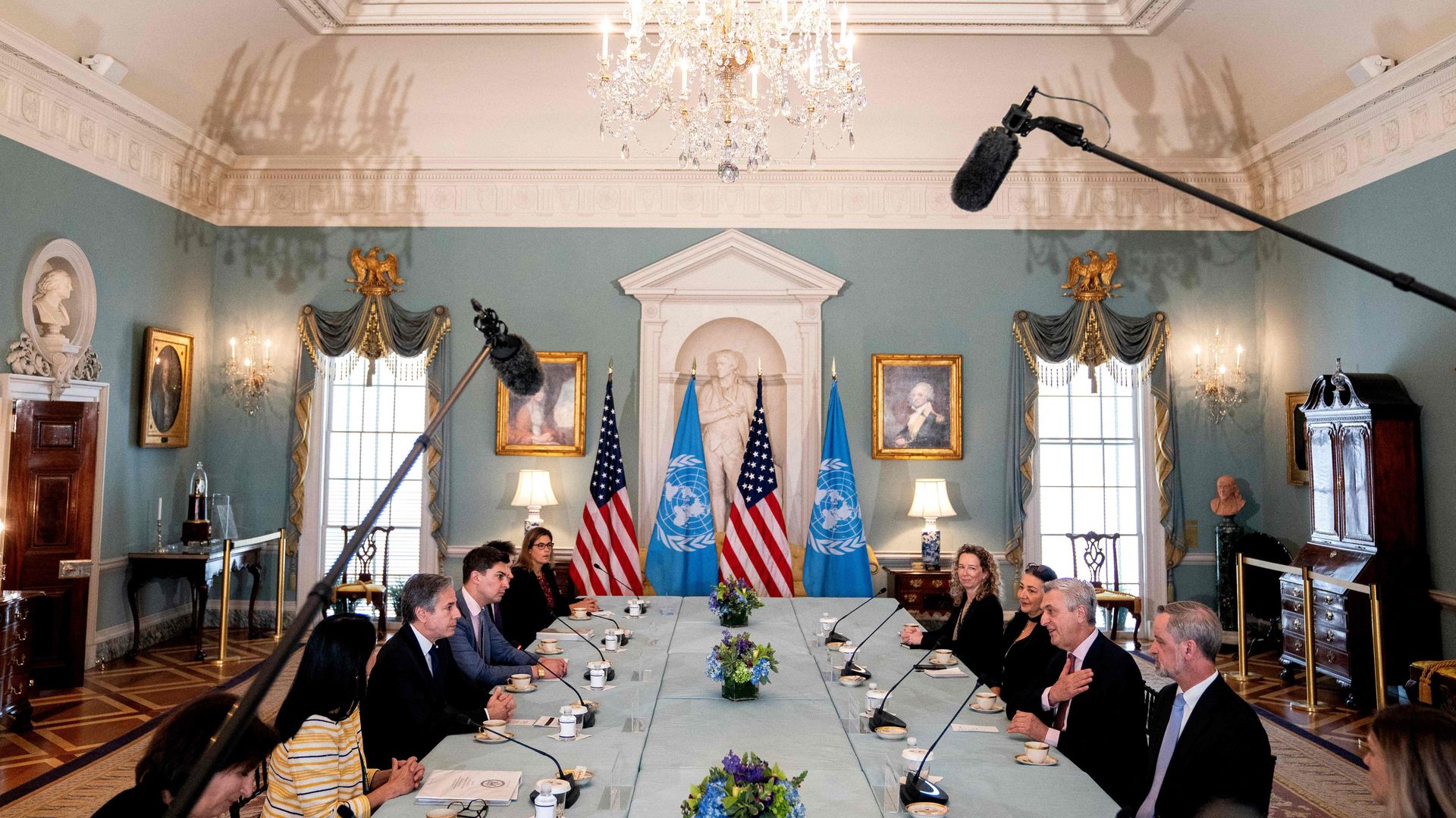 Secretary of State Antony Blinken is seen meeting with the U.N. high commissioner for refugees.