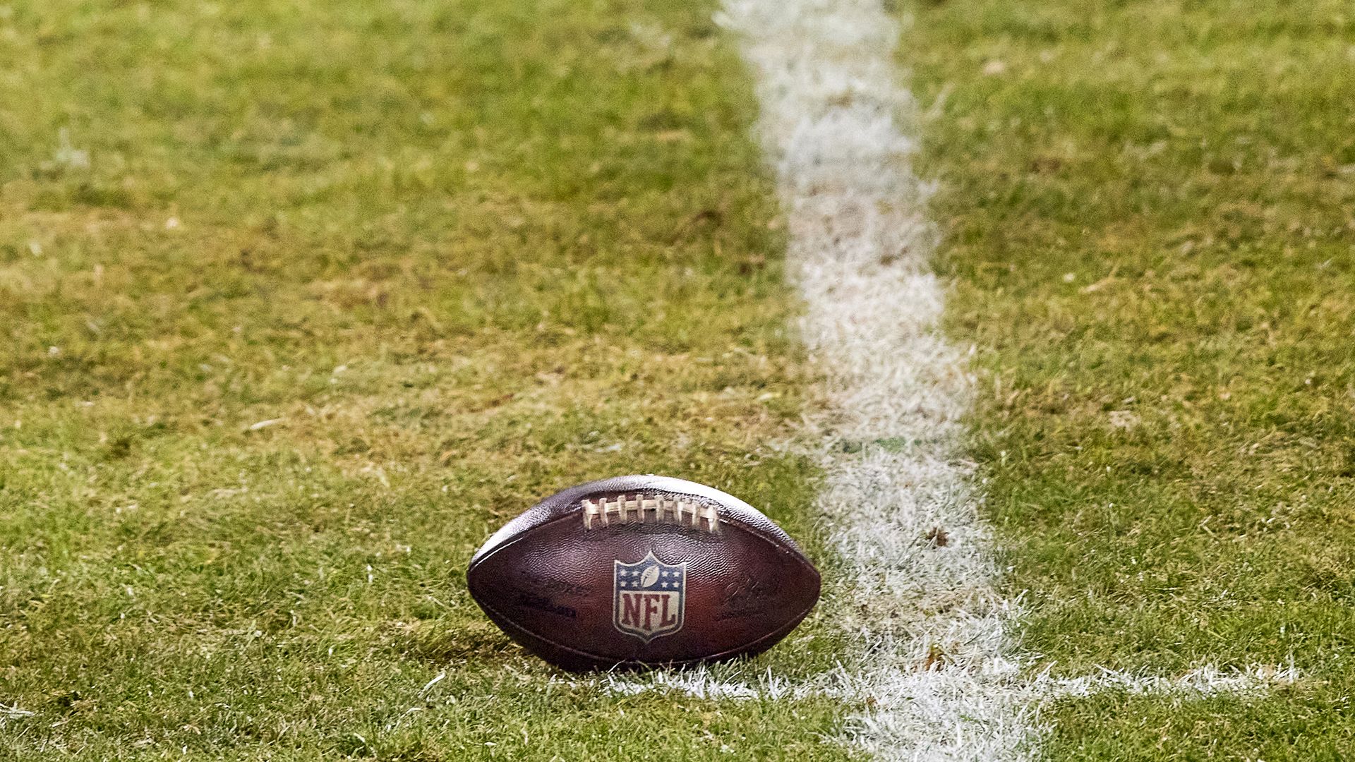 Photo of an NFL football on a football field
