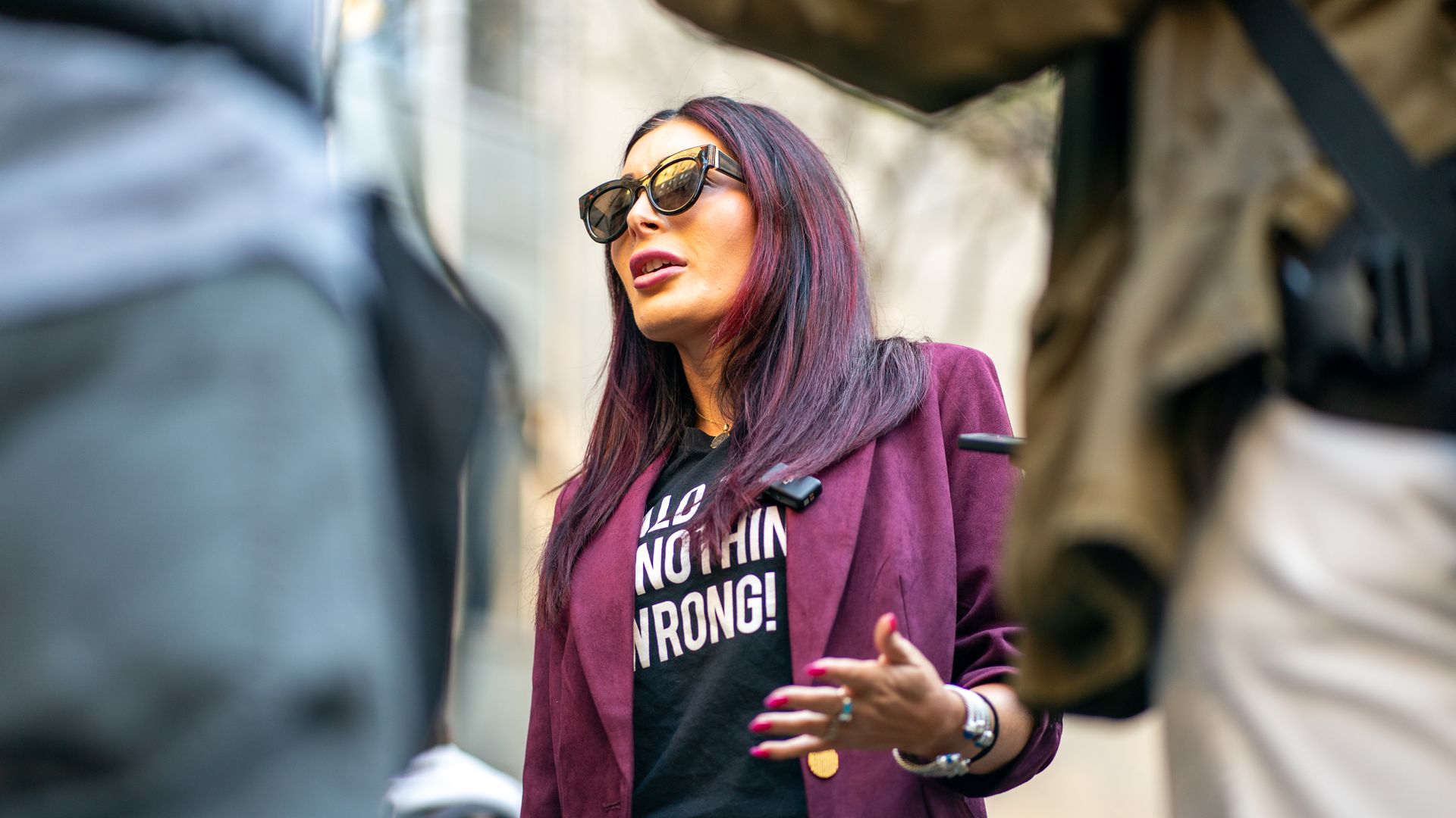 Laura Loomer speaks to the media prior to the beginning of former President Donald Trump's Trial at Manhattan Criminal Court on April 15, 2024