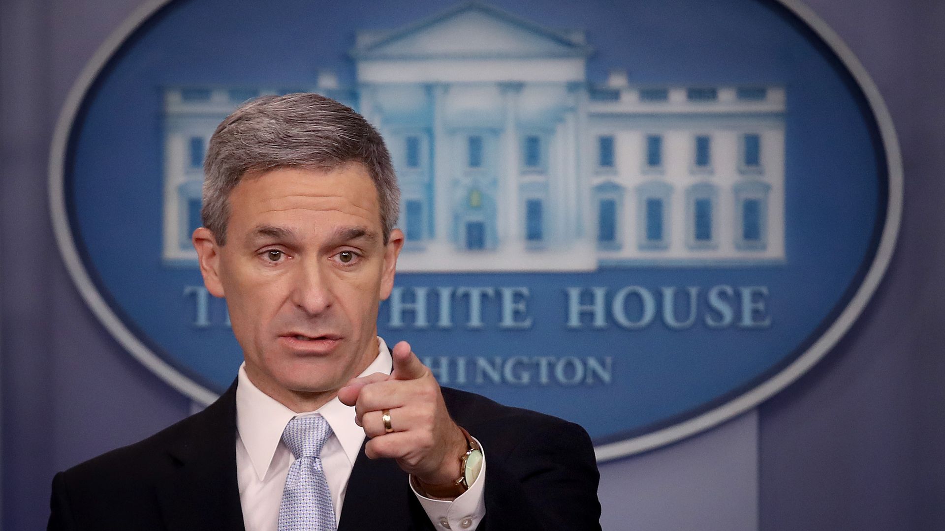 Ken Cuccinelli speaking from the White House press briefing room.