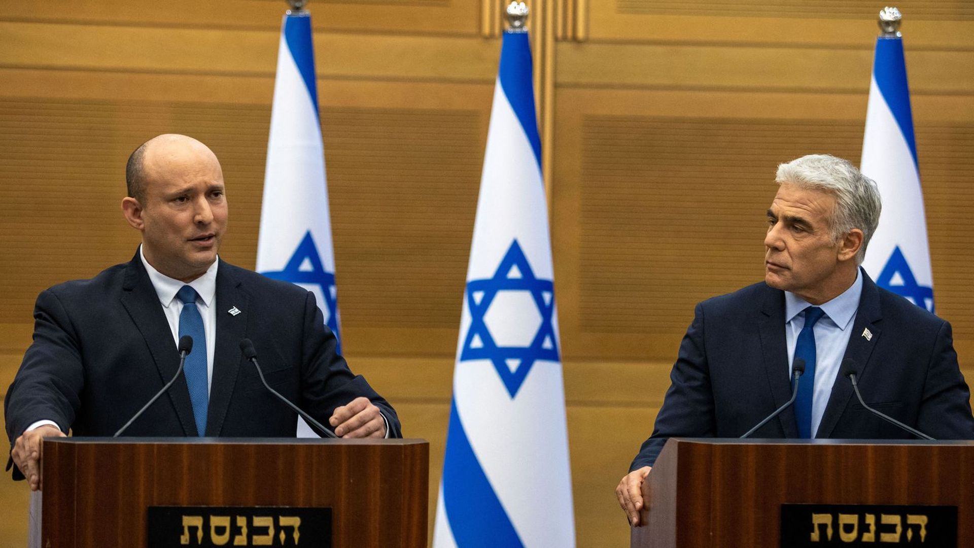 Naftali Bennett and Yair Lapid at a press conference on June 20. Photo: Oren Ben Hakoon/AFP via Getty Images